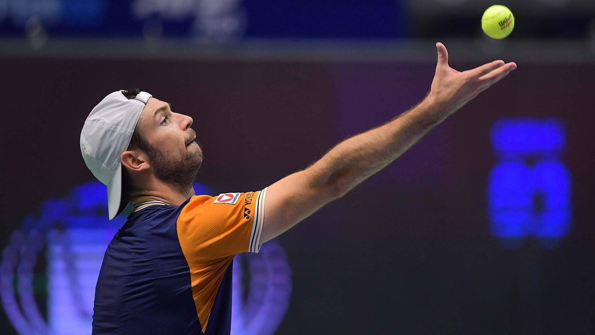 Jurij Rodionov in action during his second-round upset of Sebastian Baez on Friday in Astana.