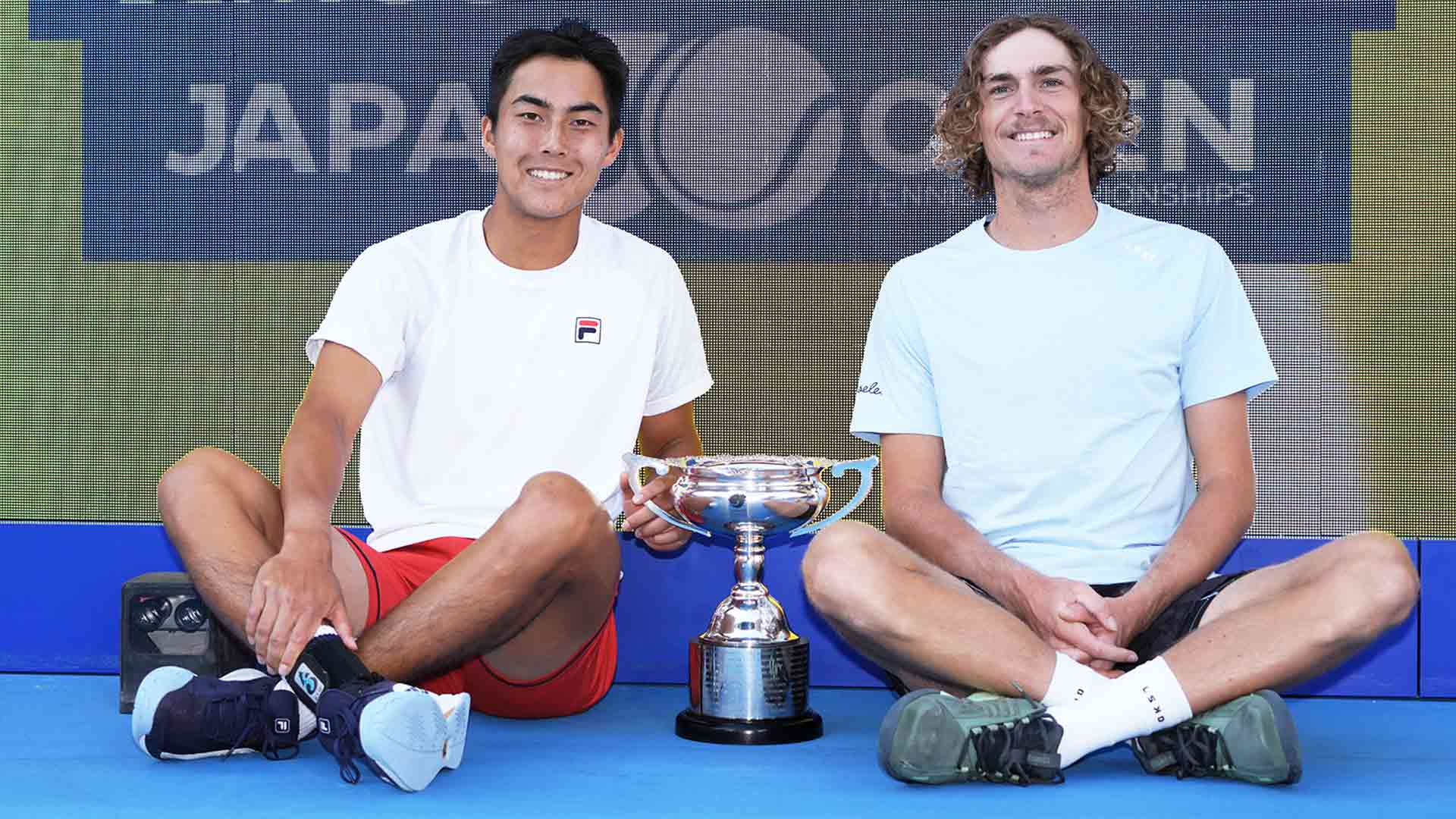 Rinky Hijikata and Max Purcell celebrate winning the title in Tokyo.