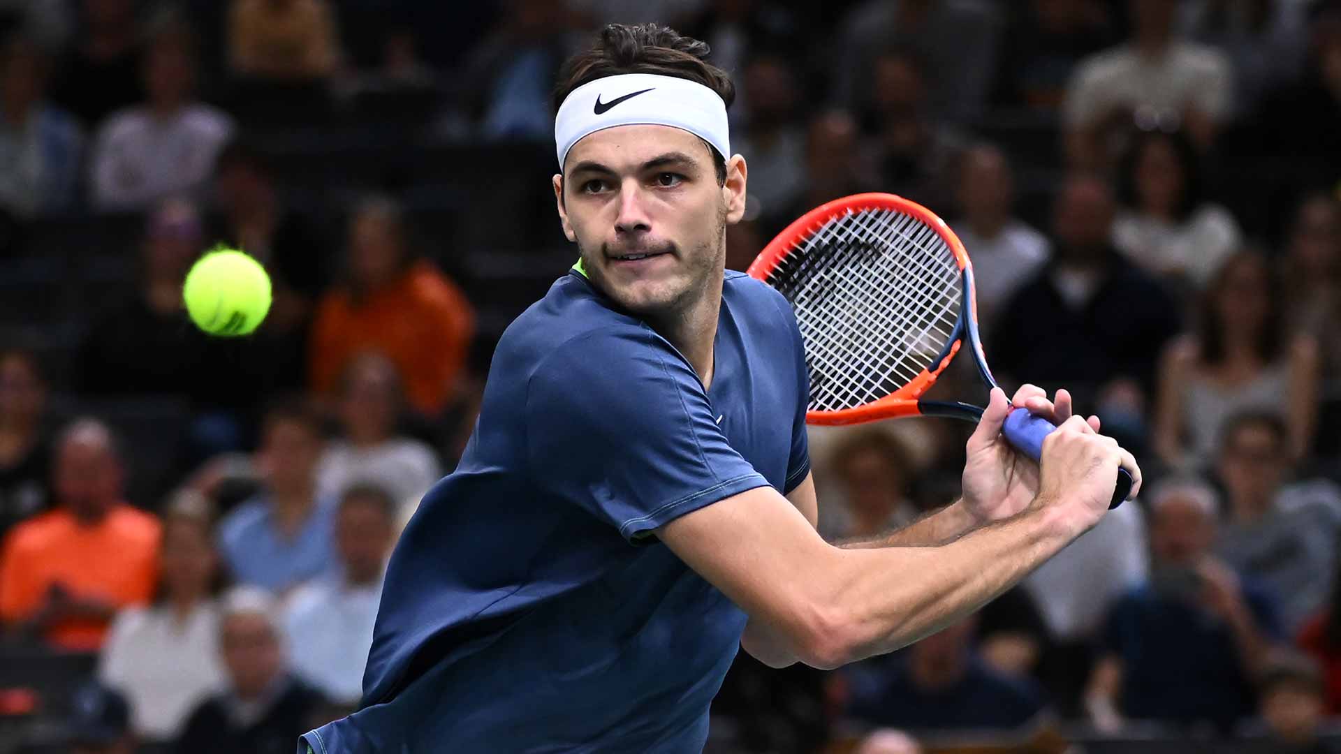Taylor Fritz powers 29 winners on Monday to reach the second round at the Rolex Paris Masters.