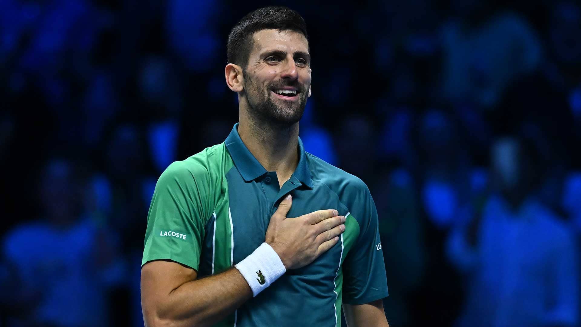 Novak Djokovic smiles after defeating Carlos Alcaraz in straight sets on Saturday evening in Turin.