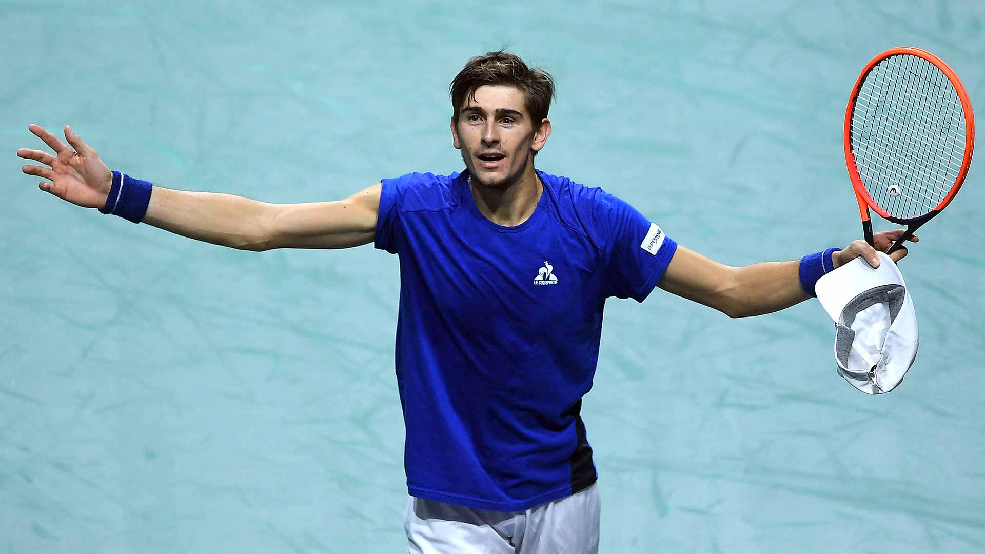 <a href='https://www.atptour.com/en/players/matteo-arnaldi/a0fc/overview'>Matteo Arnaldi</a> celebrates a three-set win over <a href='https://www.atptour.com/en/players/alexei-popyrin/p09z/overview'>Alexei Popyrin</a> in the Davis Cup final.