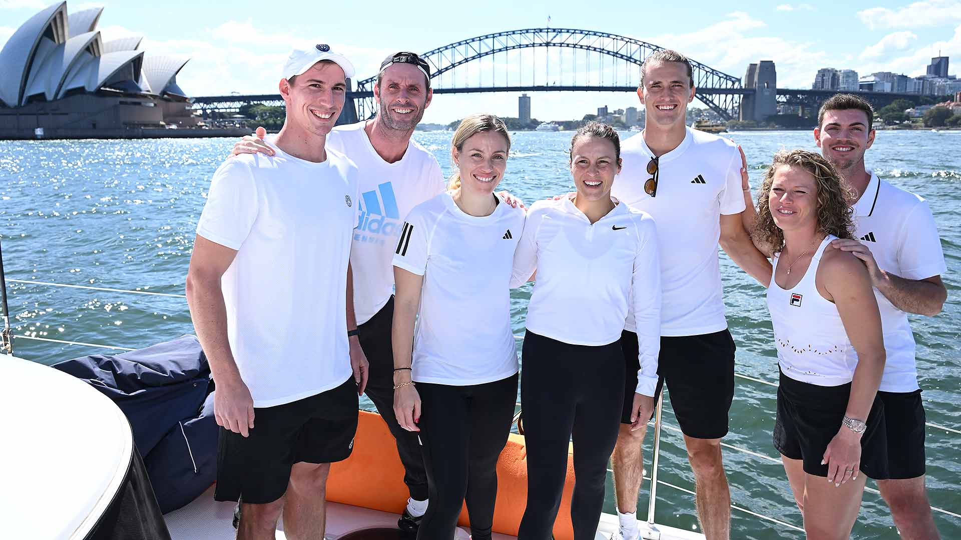 Team Germany relaxes on Sydney Harbour Thursday.