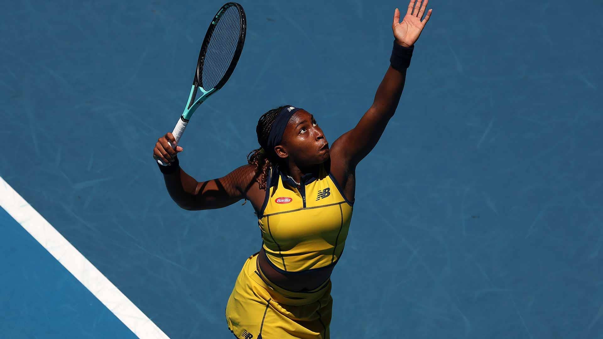 Coco Gauff serves during her first-round match at the Australian Open.