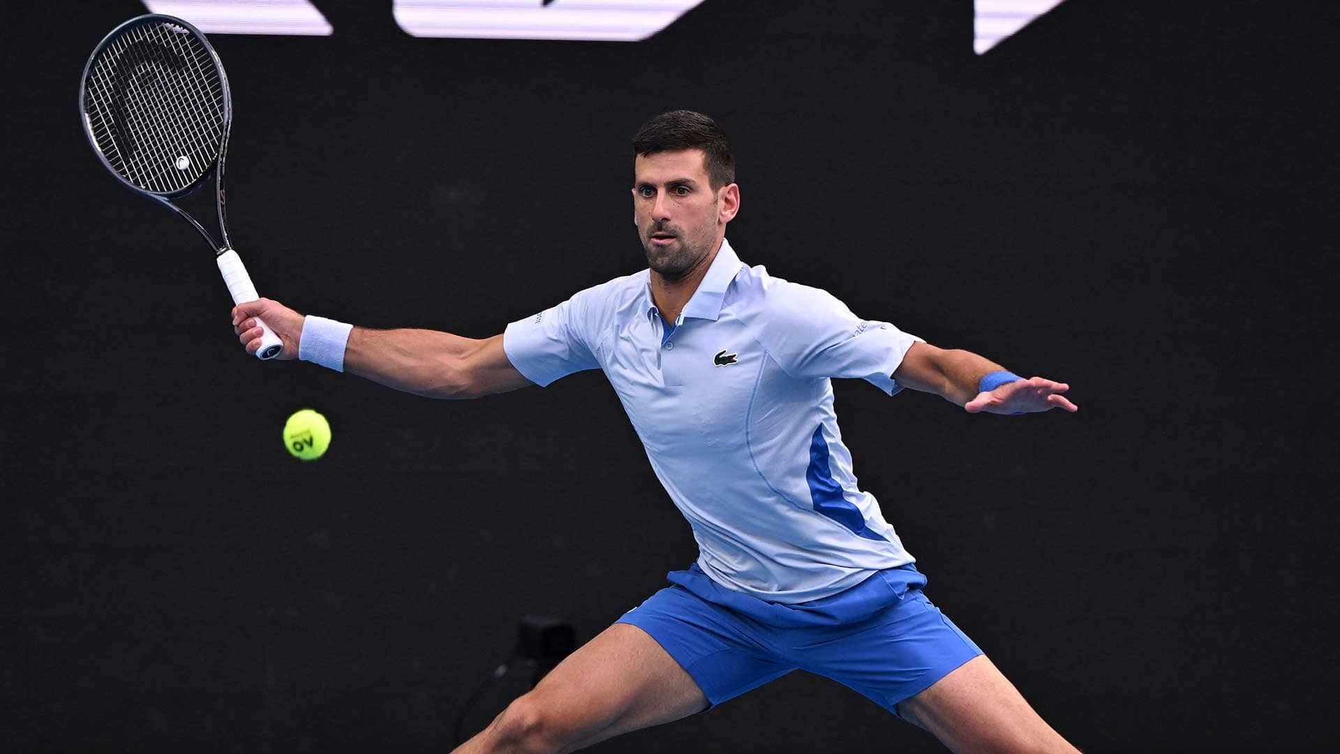 Novak Djokovic in action against Tomas Martin Etcheverry on Friday at the Australian Open.