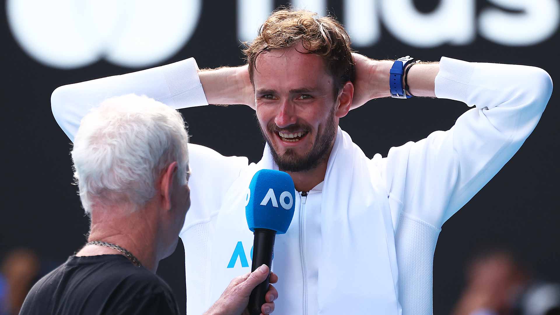 Daniil Medvedev jokes with John McEnroe during his on-court interview on Wednesday in Melbourne.