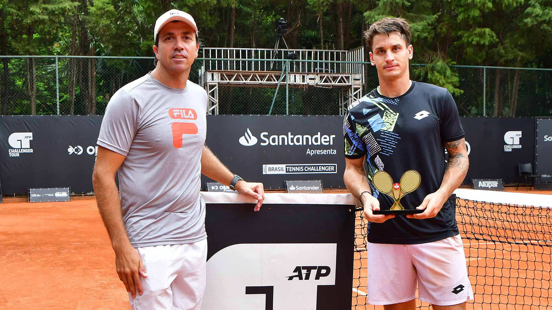 <a href='https://www.atptour.com/en/players/camilo-ugo-carabelli/u182/overview'>Camilo Ugo Carabelli</a> and coach <a href='https://www.atptour.com/en/players/carlos-berlocq/b884/overview'>Carlos Berlocq</a> after the Argentine won the <a href='https://www.atptour.com/en/scores/archive/piracicaba/2835/2025/results'>Brasil Tennis Challenger</a>.
