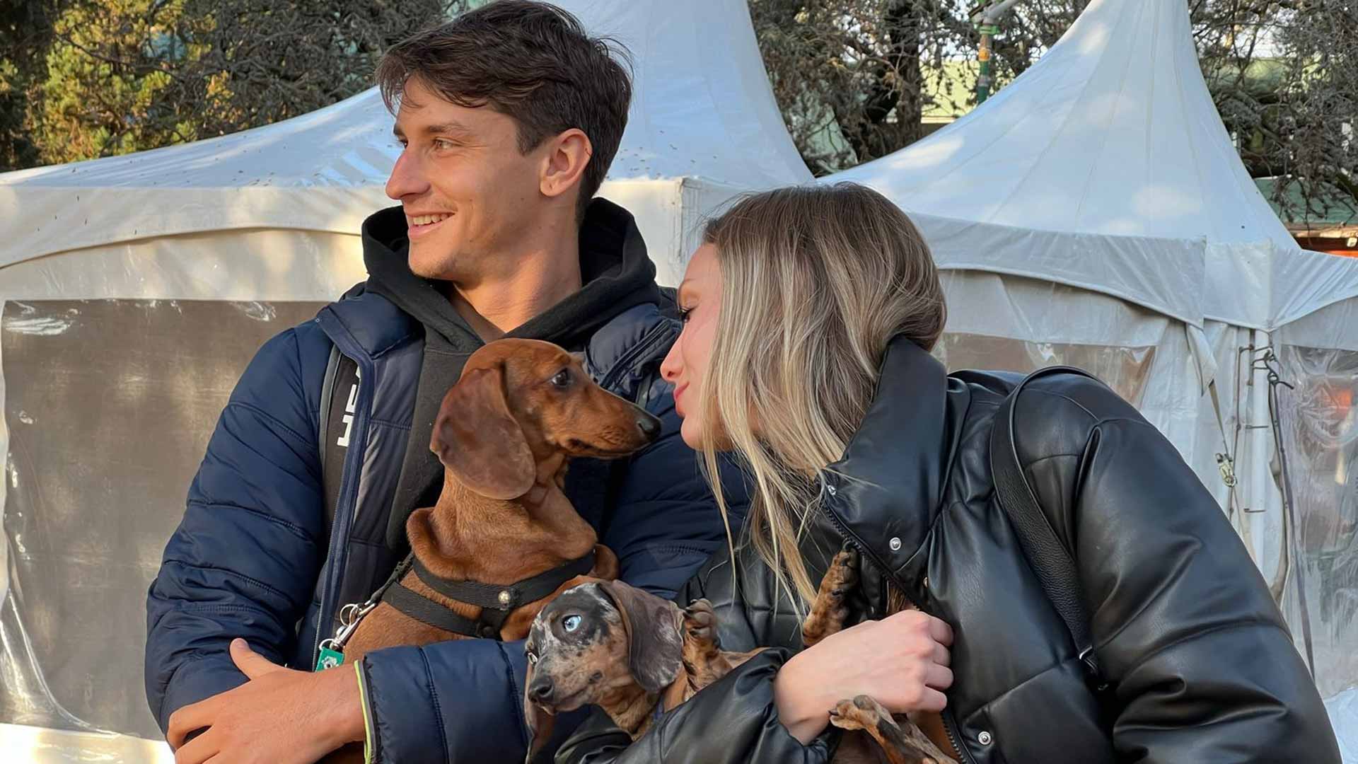<a href='https://www.atptour.com/en/players/camilo-ugo-carabelli/u182/overview'>Camilo Ugo Carabelli</a> and his dogs Romea and Antonia.