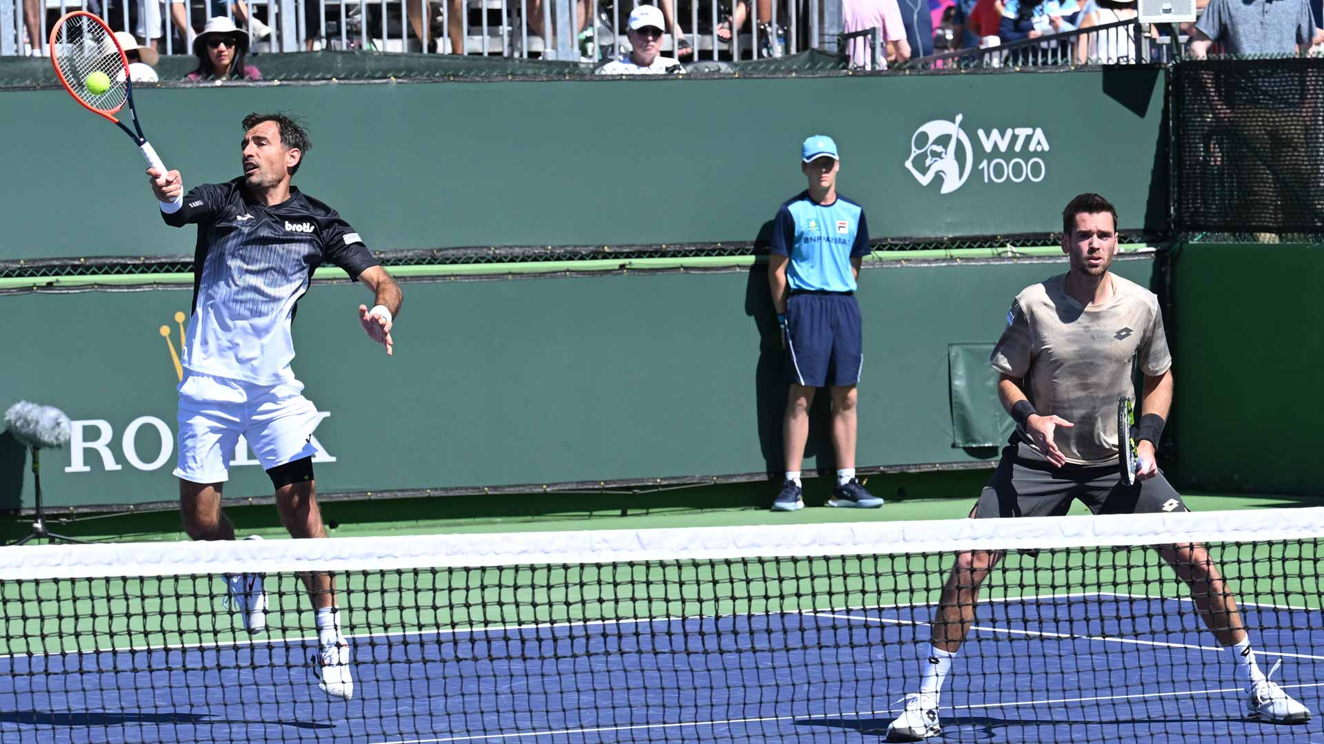 Ivan Dodig and Austin Krajicek in action at the BNP Paribas Open.