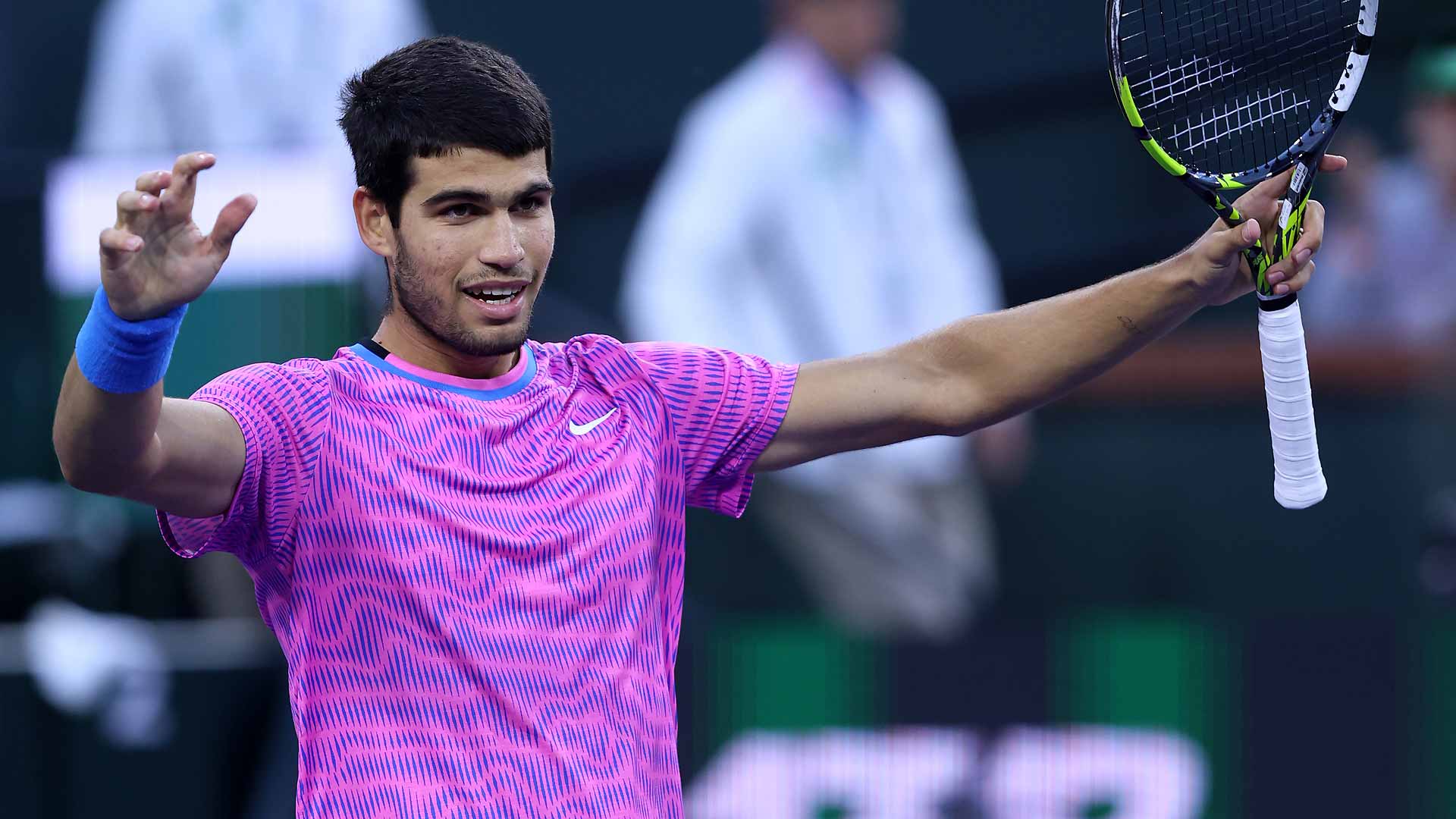 Carlos Alcaraz celebrates after defeating Jannik Sinner on Saturday in Indian Wells.