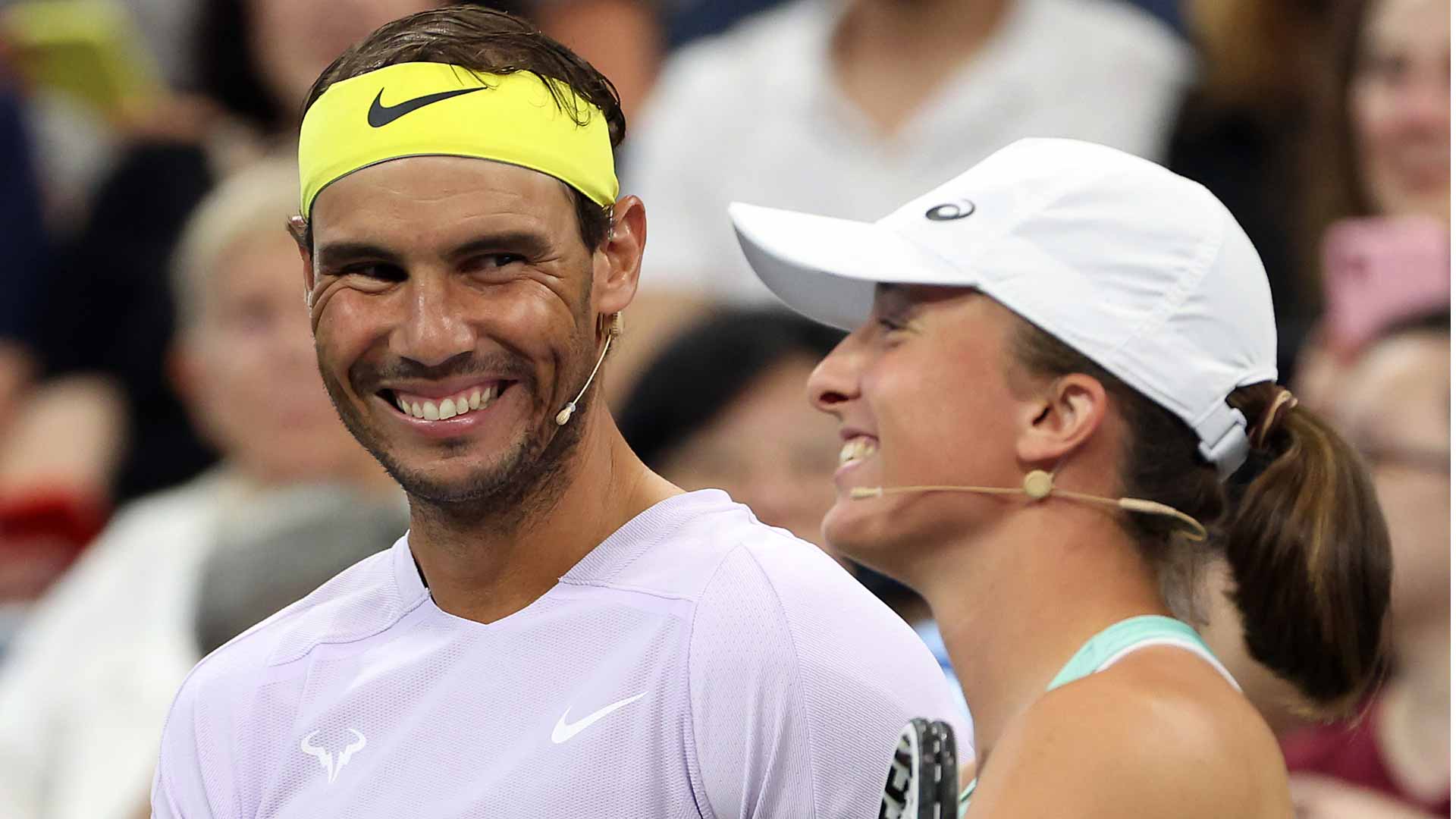 Rafael Nadal and Iga Swiatek share a laugh at a charity exhibition in New York in 2022.