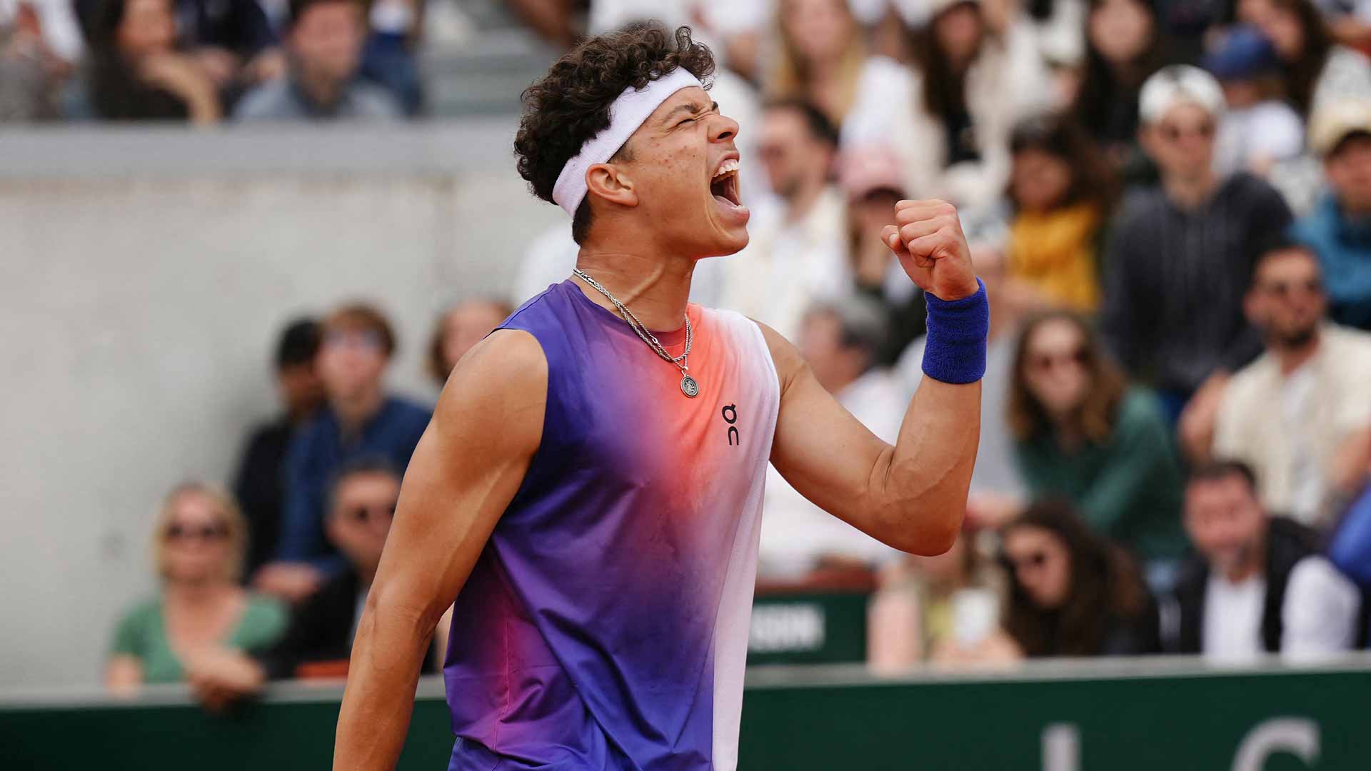 Ben Shelton celebrates during his first-round win against Hugo Gaston on Monday at Roland Garros.