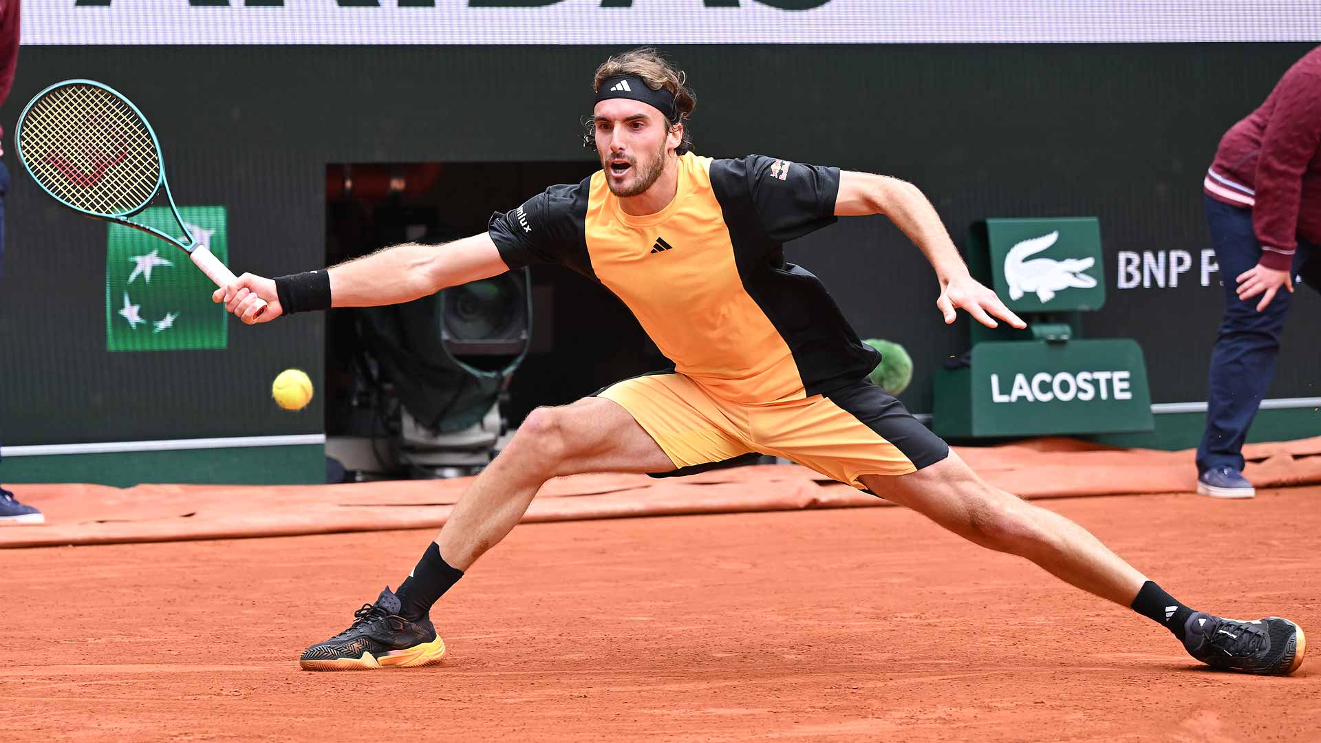 Stefanos Tsitsipas battles past Matteo Arnaldi on Sunday to reach the quarter-finals at Roland Garros.