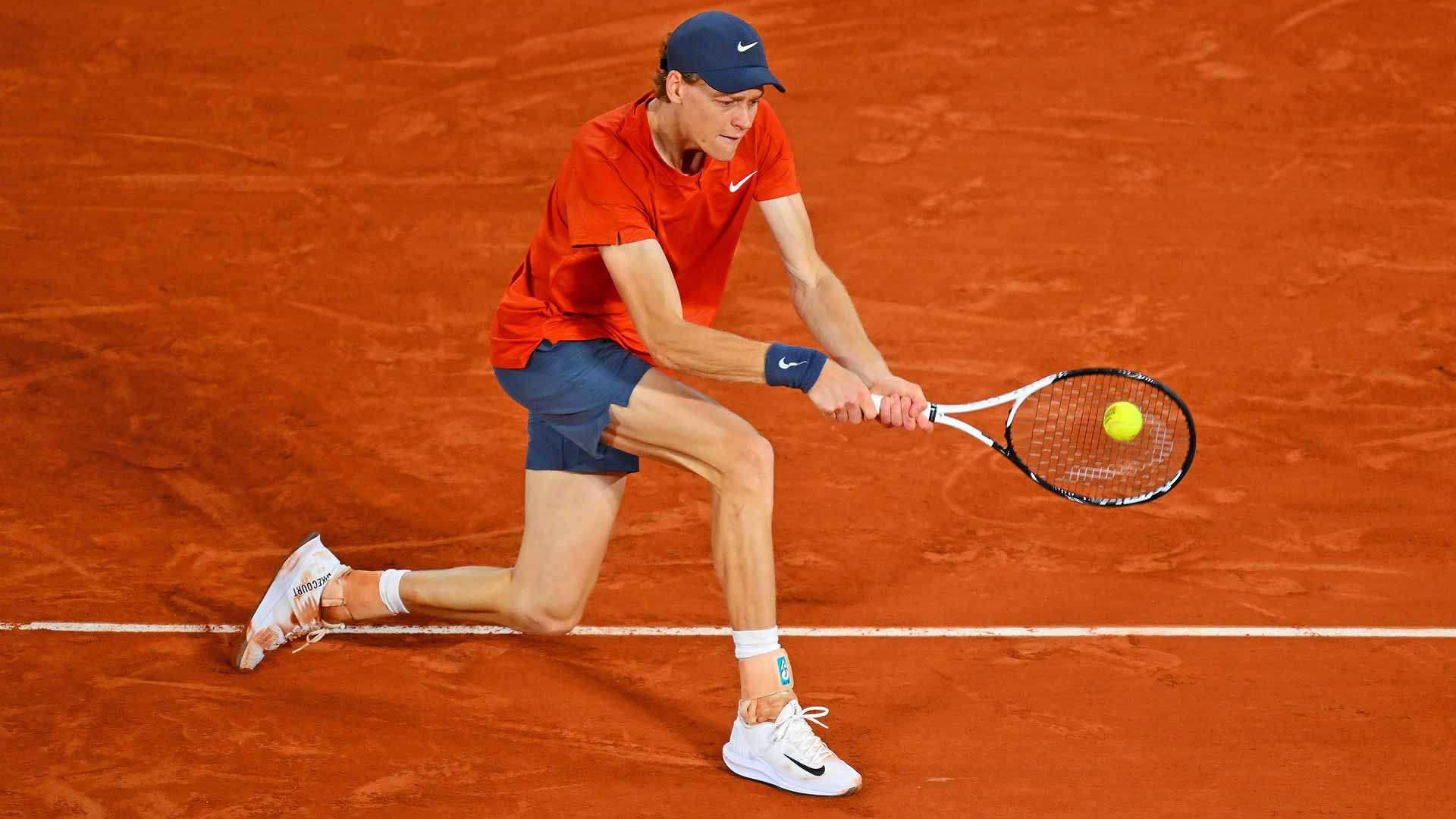 Jannik Sinner in fourth-round action against Corentin Moutet on Sunday night at Roland Garros.