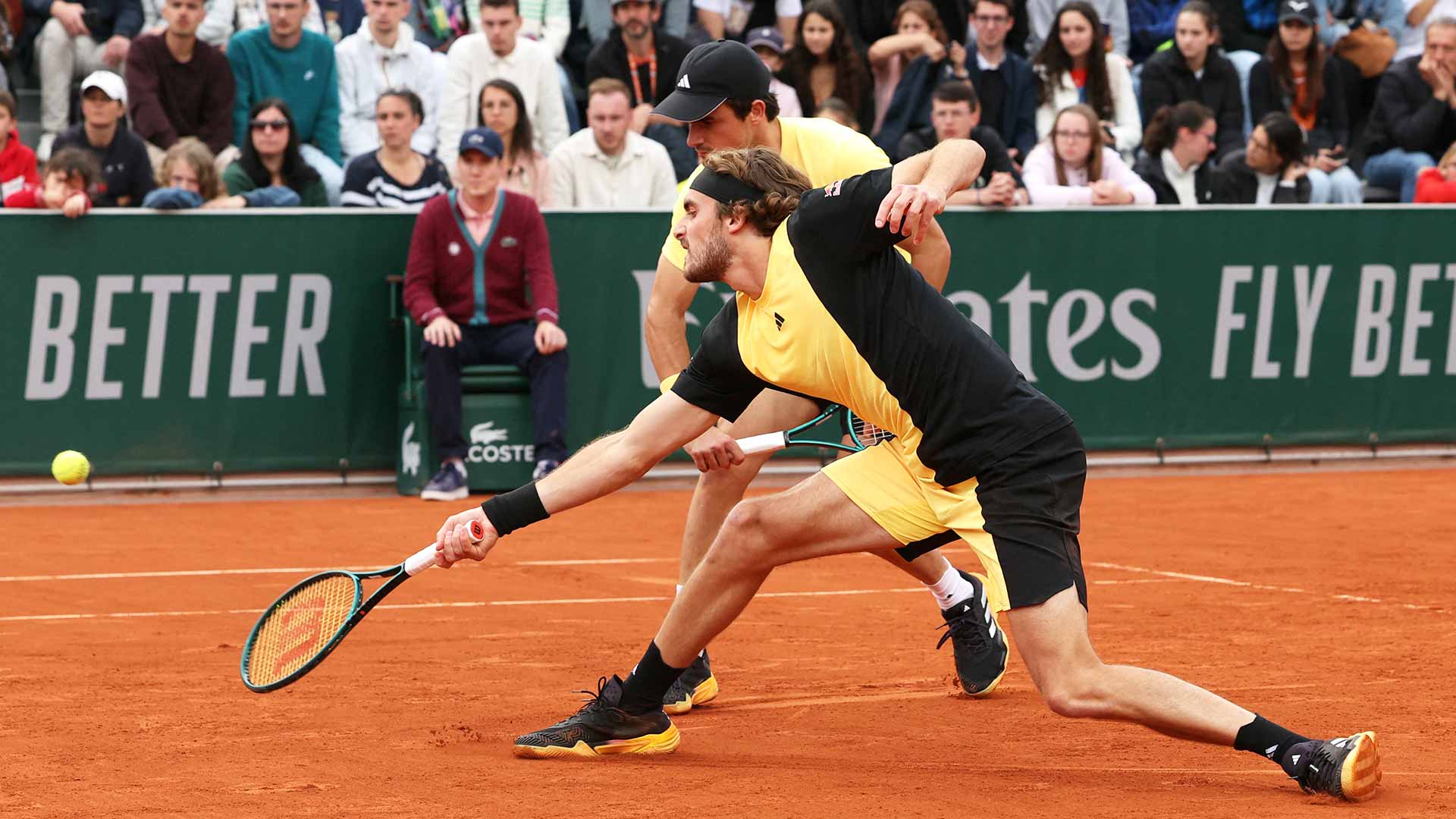 Stefanos Tsitsipas and Petros Tsitsipas in action in Paris.