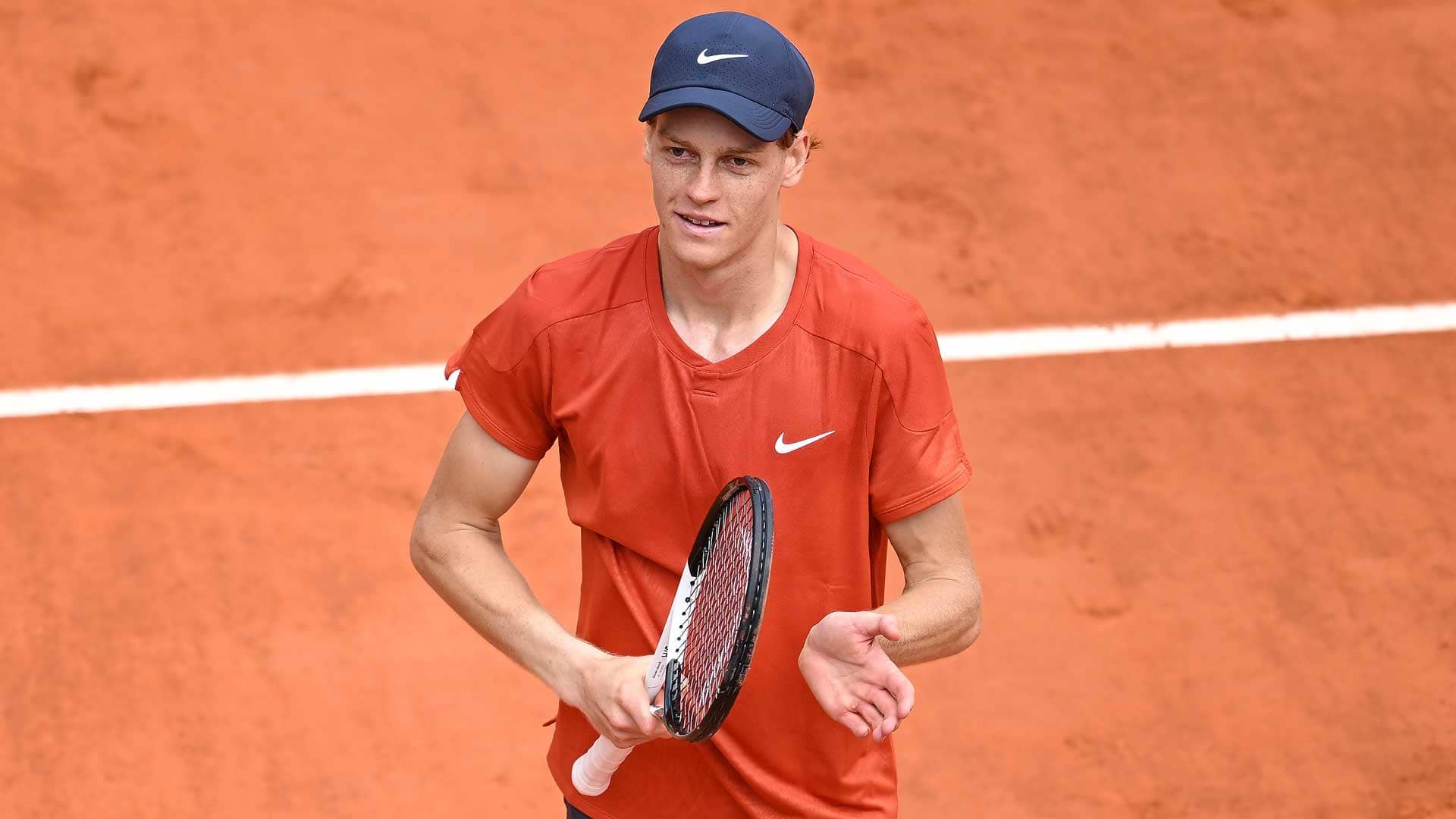 Jannik Sinner celebrates his straight-sets win against Grigor Dimitrov on Tuesday at Roland Garros.