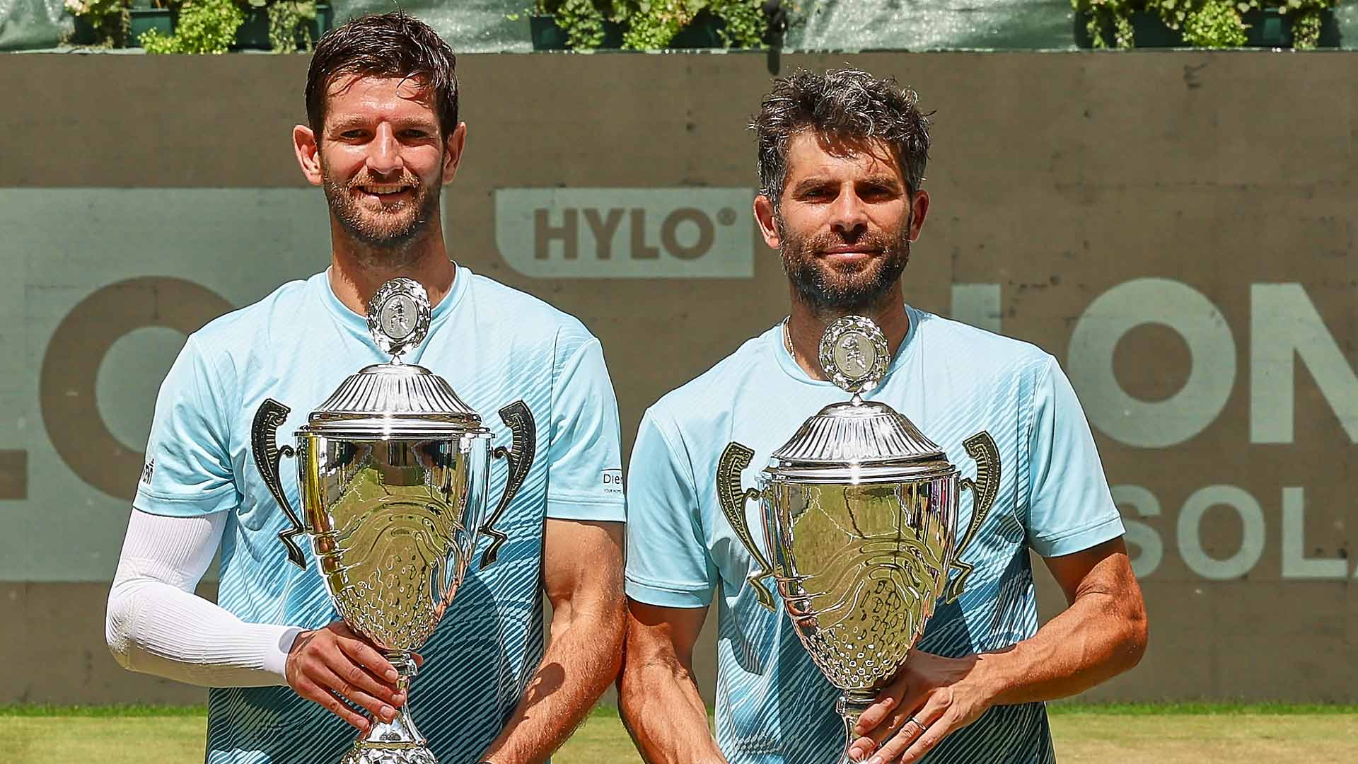 Andrea Vavassori and Simone Bolelli celebrate their win against Kevin Krawietz and Tim Puetz Sunday in the Halle final.