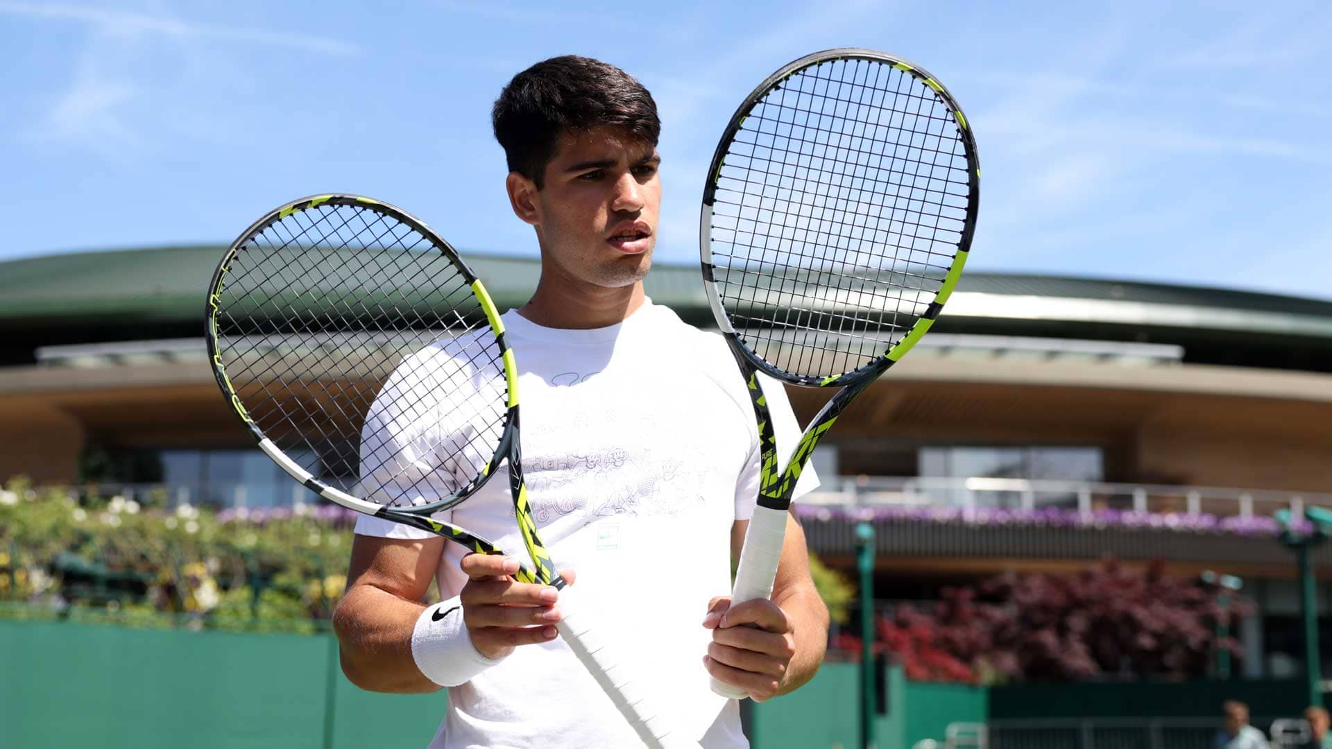 Carlos Alcaraz begins his Wimbledon title defense on Monday against Mark Lajal.