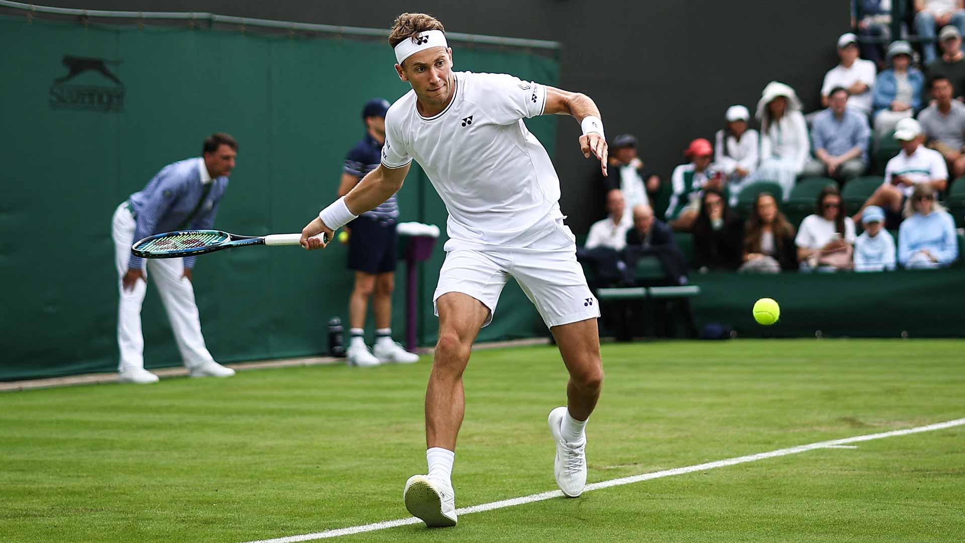 Casper Ruud defeats Alex Bolt in straight sets on Monday at Wimbledon.