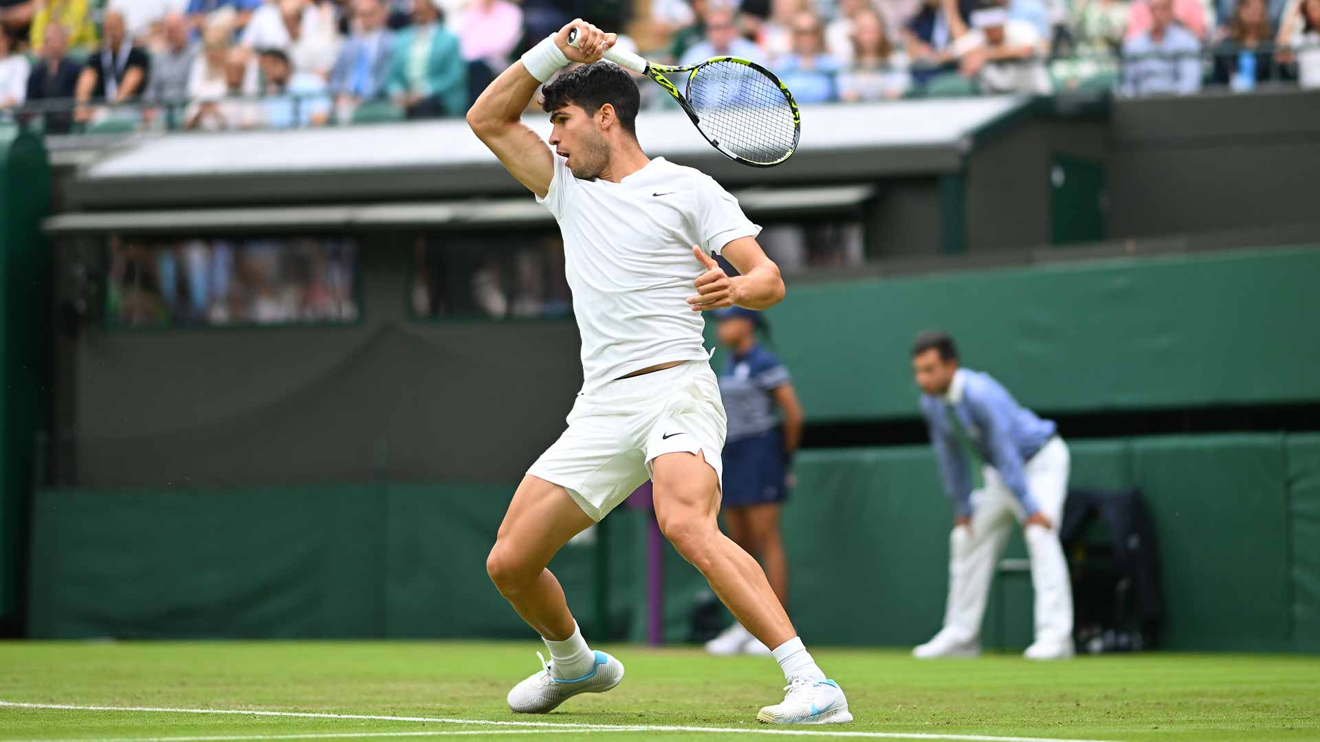 Carlos Alcaraz in action against Aleksandar Vukic on Wednesday at Wimbledon.