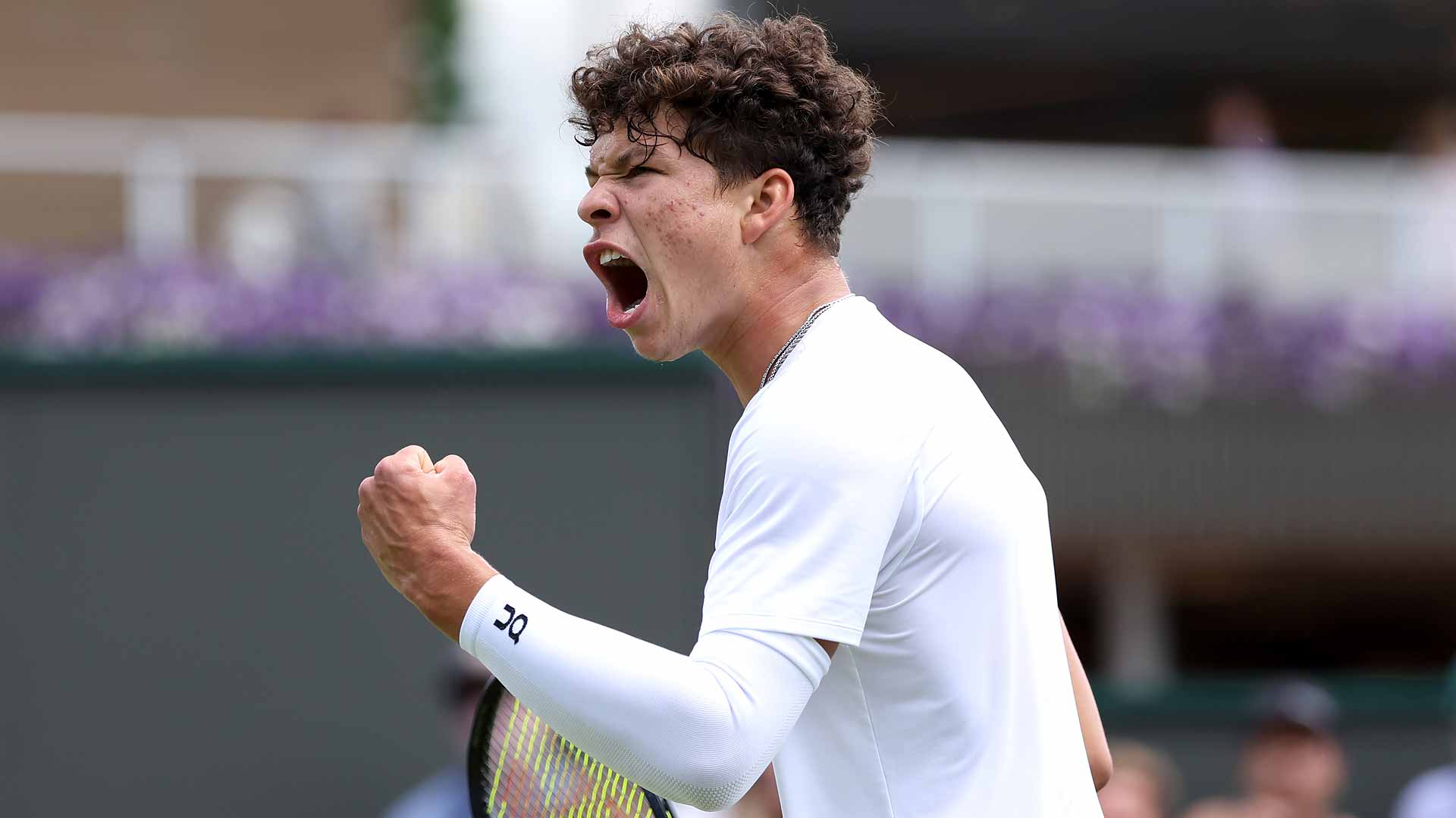 Ben Shelton defeats Lloyd Harris in five sets on Court 18 at Wimbledon Thursday.