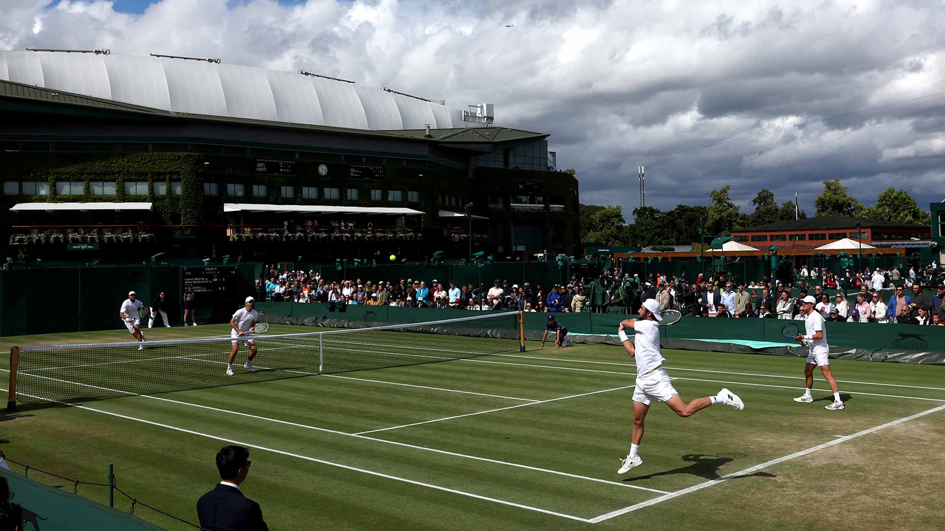 Jordan Thompson fires a backhand during his second-round victory alongside Max Purcell on Saturday at Wimbledon.