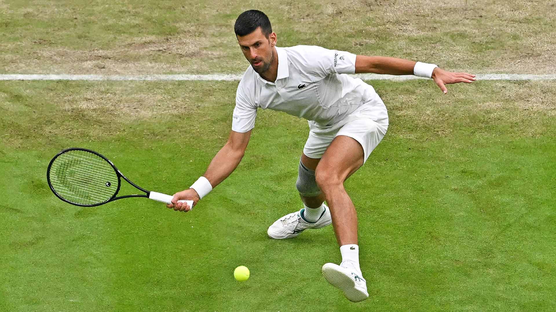 Novak Djokovic in action against Alexei Popyrin on Saturday at Wimbledon.