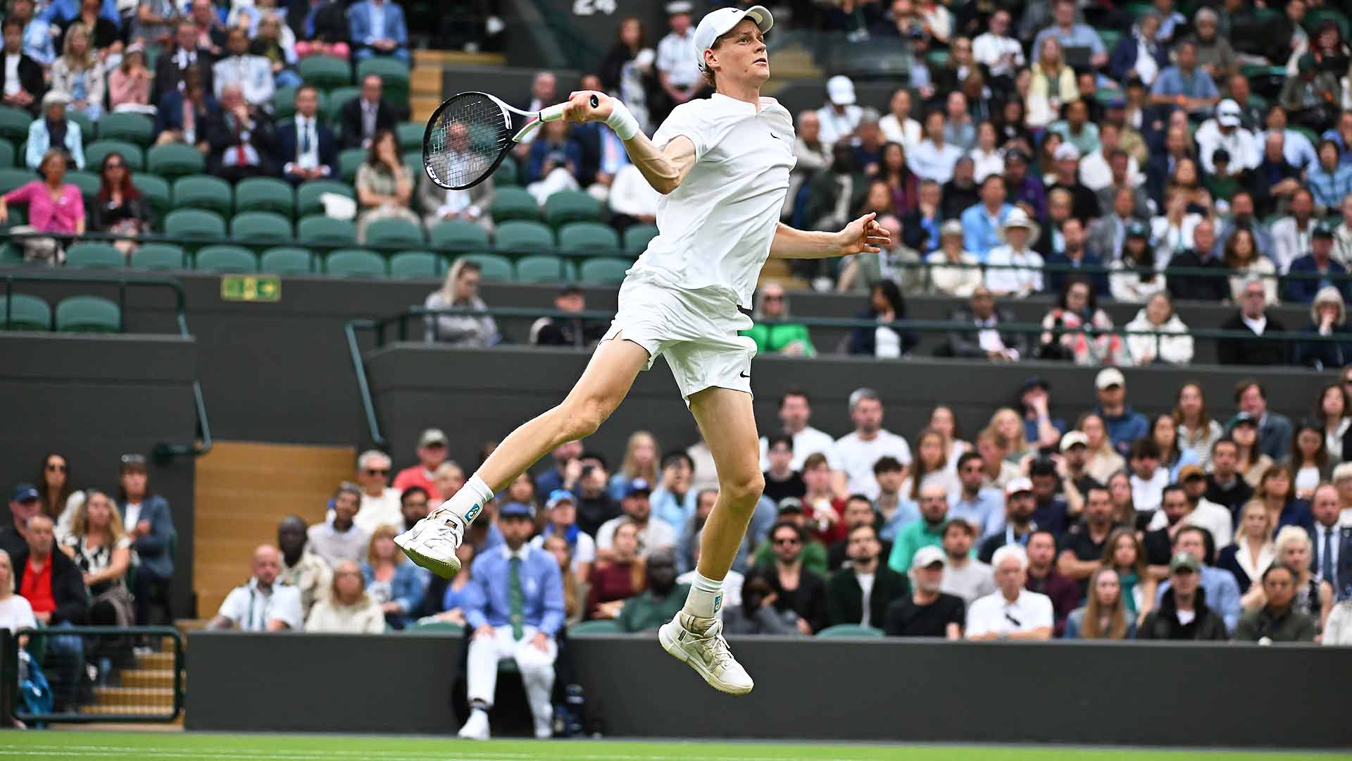 Leap of faith: Jannik Sinner charges into the Wimbledon quarter-finals.