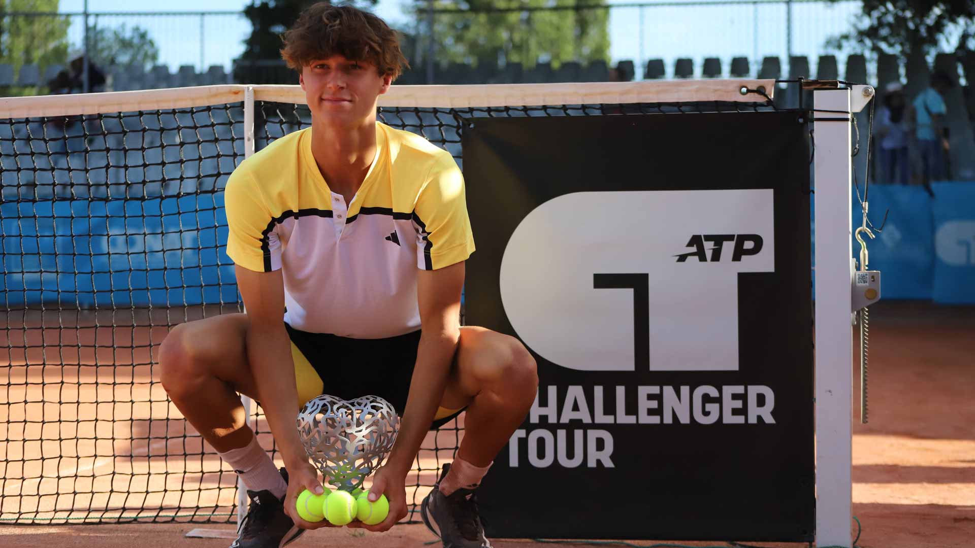 <a href='https://www.atptour.com/en/players/gabriel-debru/d0hd/overview'>Gabriel Debru</a> is crowned champion at the Troyes Challenger.