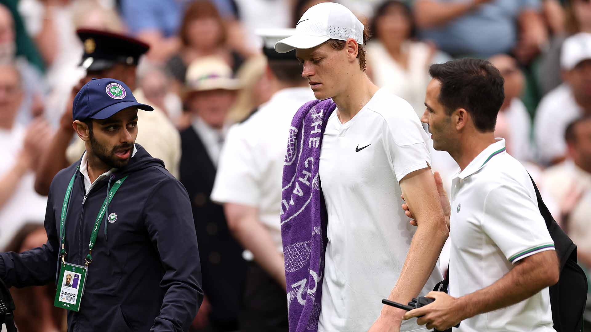 <a href='https://www.atptour.com/en/players/jannik-sinner/s0ag/overview'>Jannik Sinner</a> leaves the court to be assessed early in the third set of his <a href='https://www.atptour.com/en/tournaments/wimbledon/540/overview'>Wimbledon</a> quarter-final.