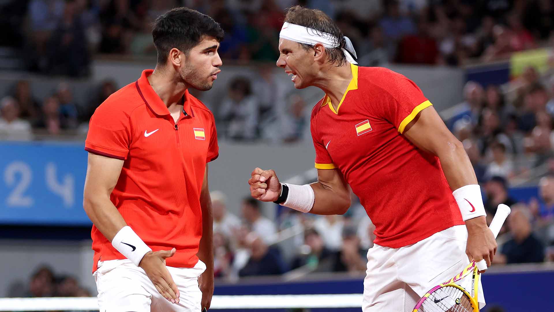 Carlos Alcaraz and Rafael Nadal come from behind in the second set to advance to the second round of the Olympic Tennis Event doubles.