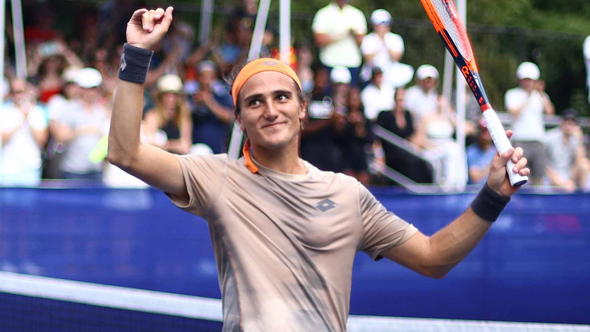 Mattia Bellucci celebrates after qualifying for an ATP 500 main draw for the first time in Washington.