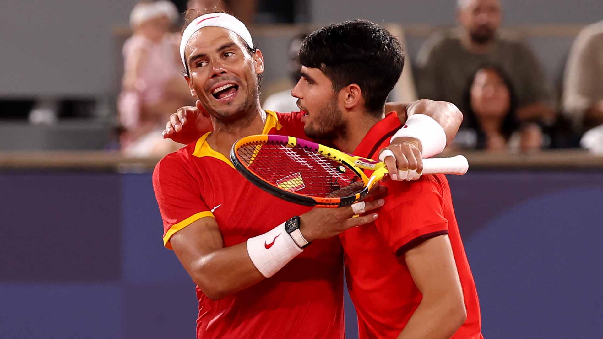 <a href='https://www.atptour.com/en/players/rafael-nadal/n409/overview'>Rafael Nadal</a> and <a href='https://www.atptour.com/en/players/carlos-alcaraz/a0e2/overview'>Carlos Alcaraz</a> embrace after their quarter-final loss.