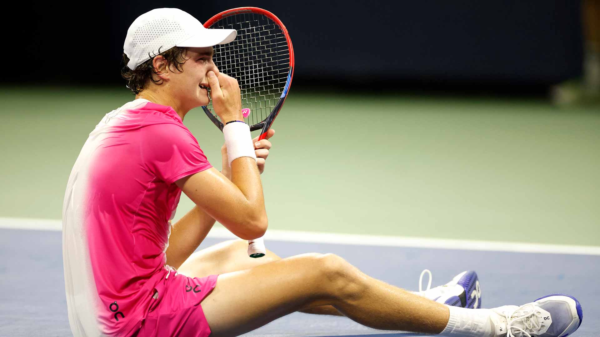 An emotional Joao Fonseca celebrates winning the 2023 US Open boys' singles title.