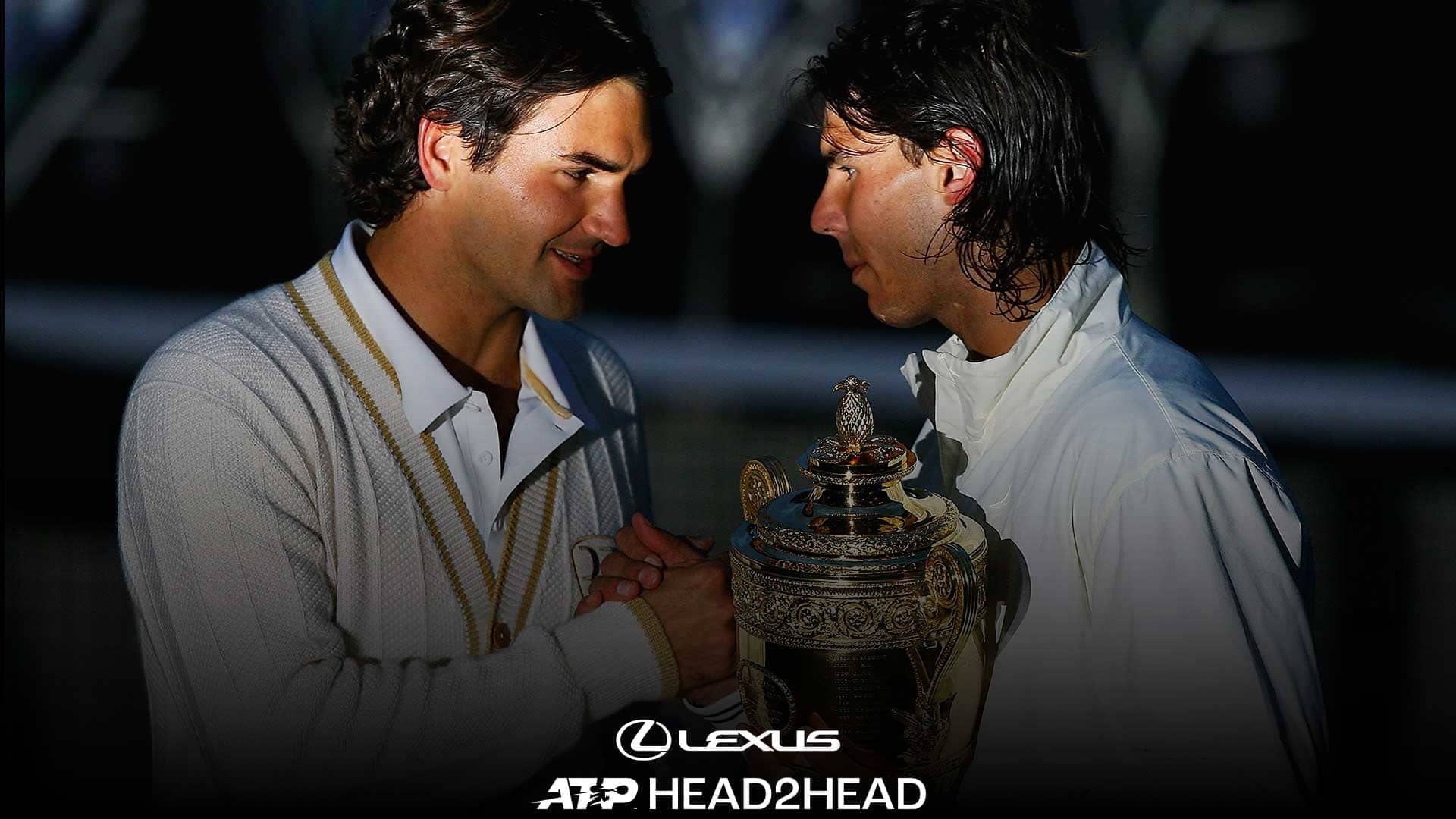 Roger Federer congratulates Rafael Nadal, who prevailed in a 9-7 fifth set in the 2008 Wimbledon final.