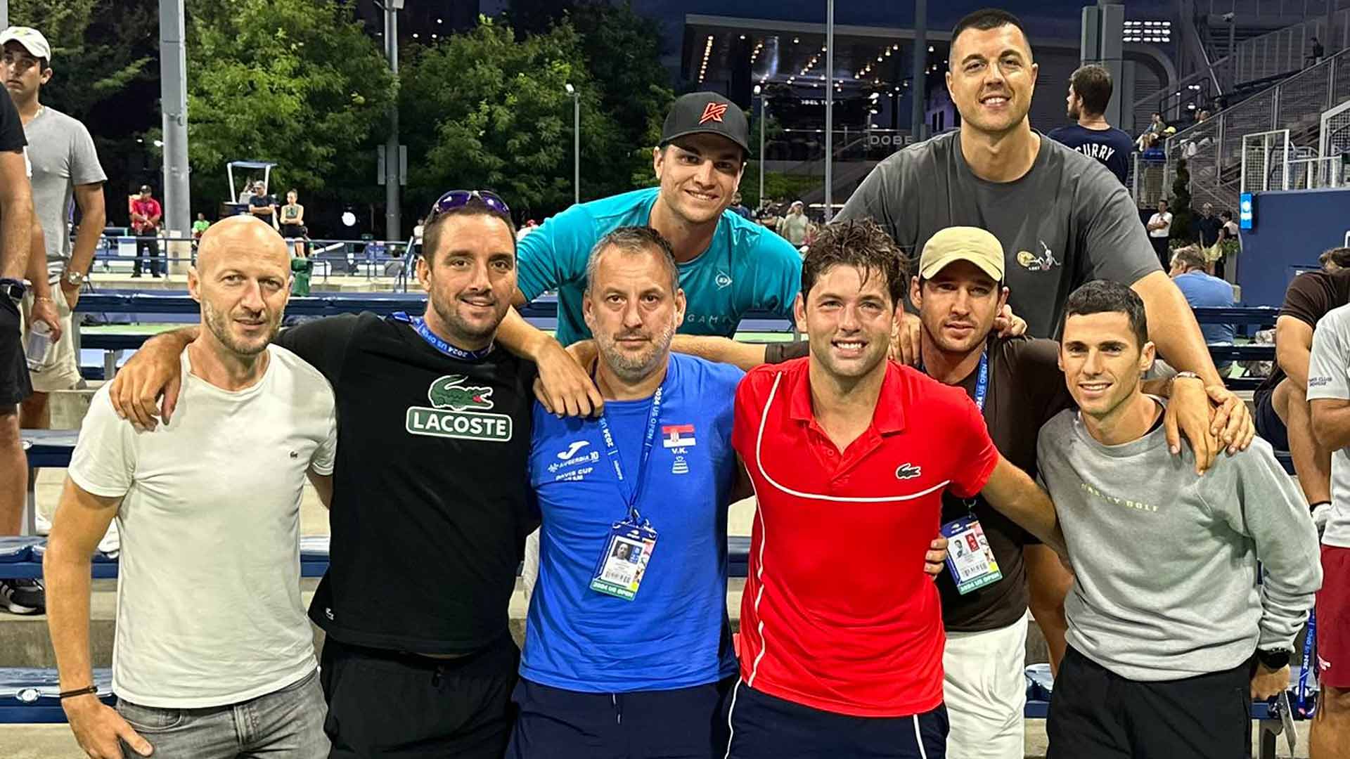 Filip Krajinovic shares a special moment with fellow players and close friends after the end of his final match on Monday in New York.