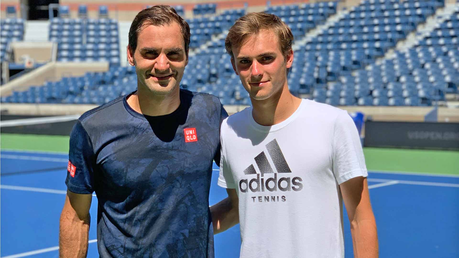 Roger Federer and Eliot Spizzirri trained together inside Arthur Ashe Stadium in 2019.