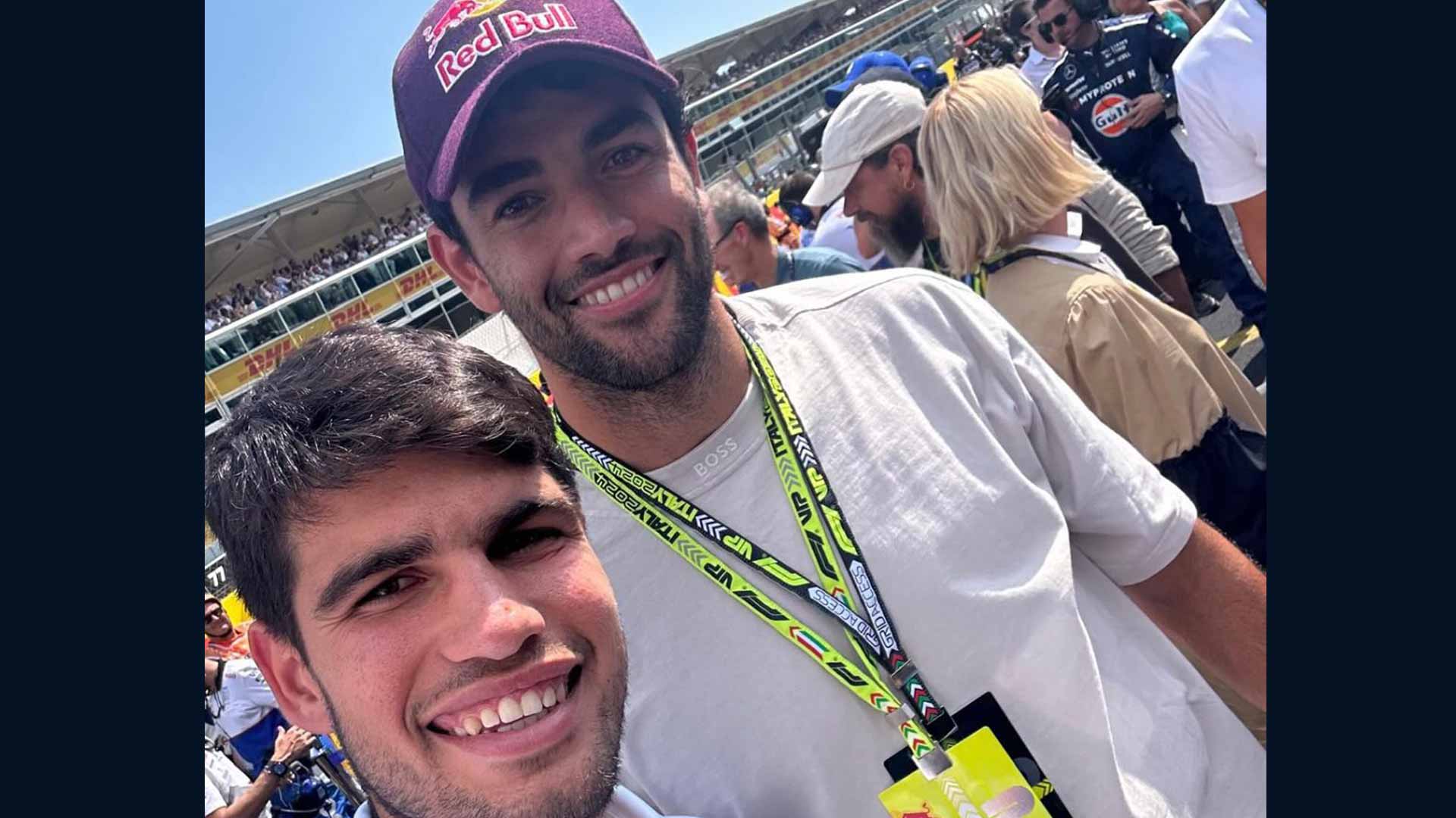 Carlos Alcaraz and Matteo Berrettini pose for a selfie at Monza.