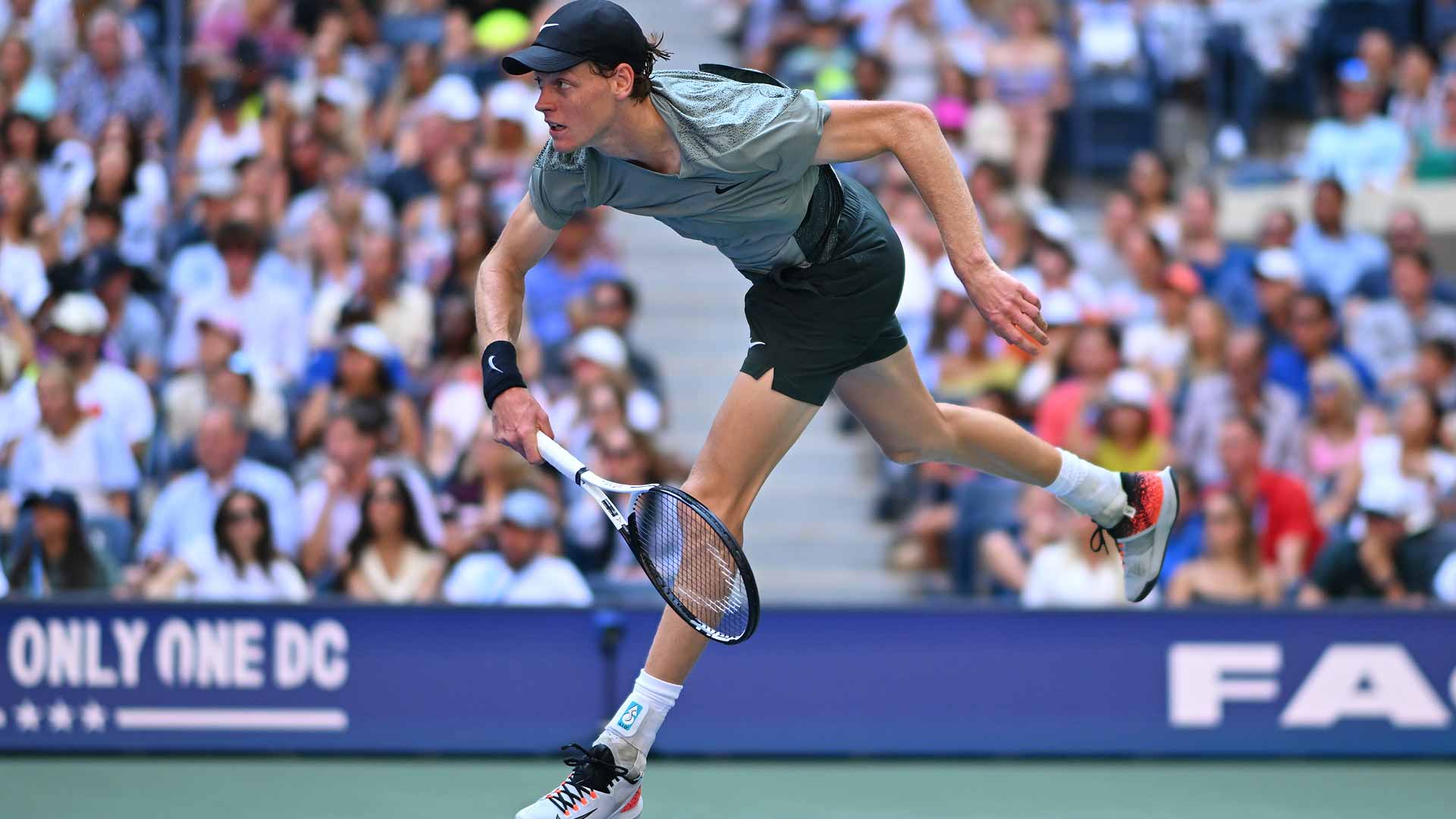 Jannik Sinner serves during the US Open, where he is pursuing his second major title.
