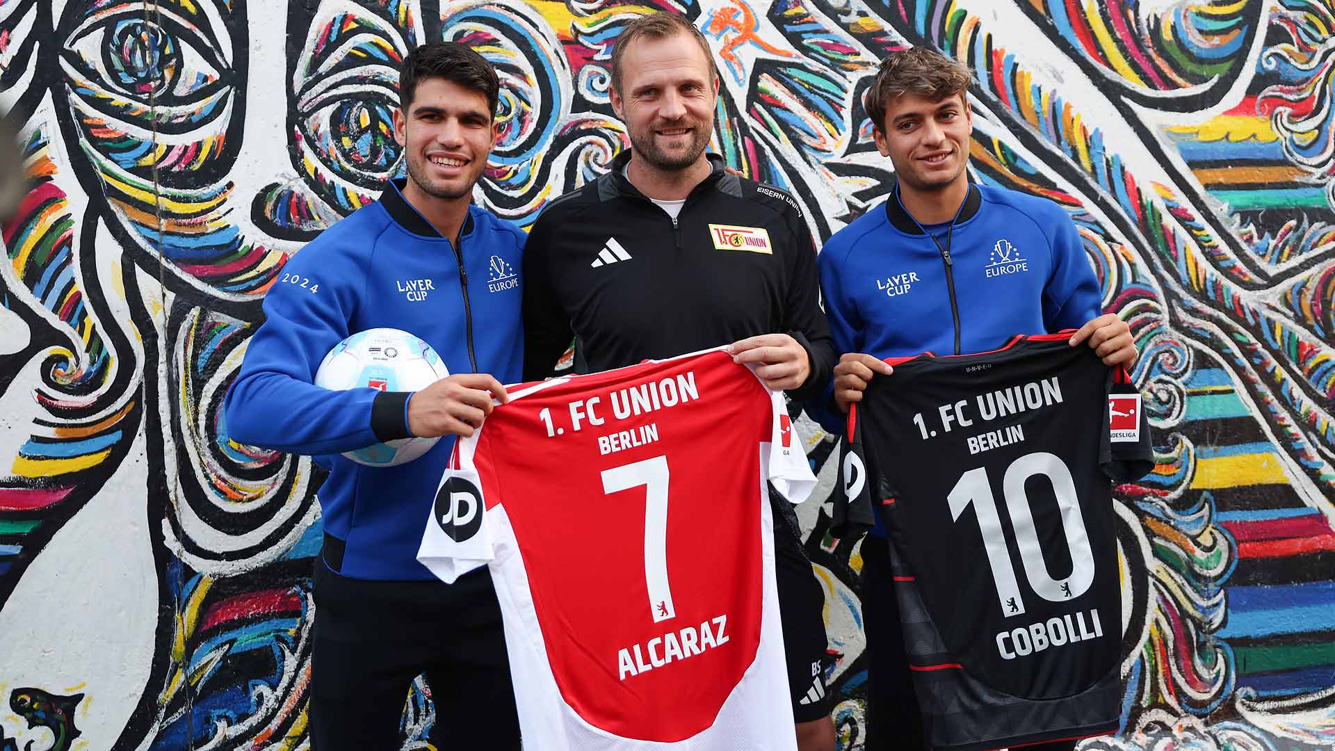 Carlos Alcaraz and Flavio Cobolli with Union Berlin's head coach Bo Svensson on Wednesday in Berlin.