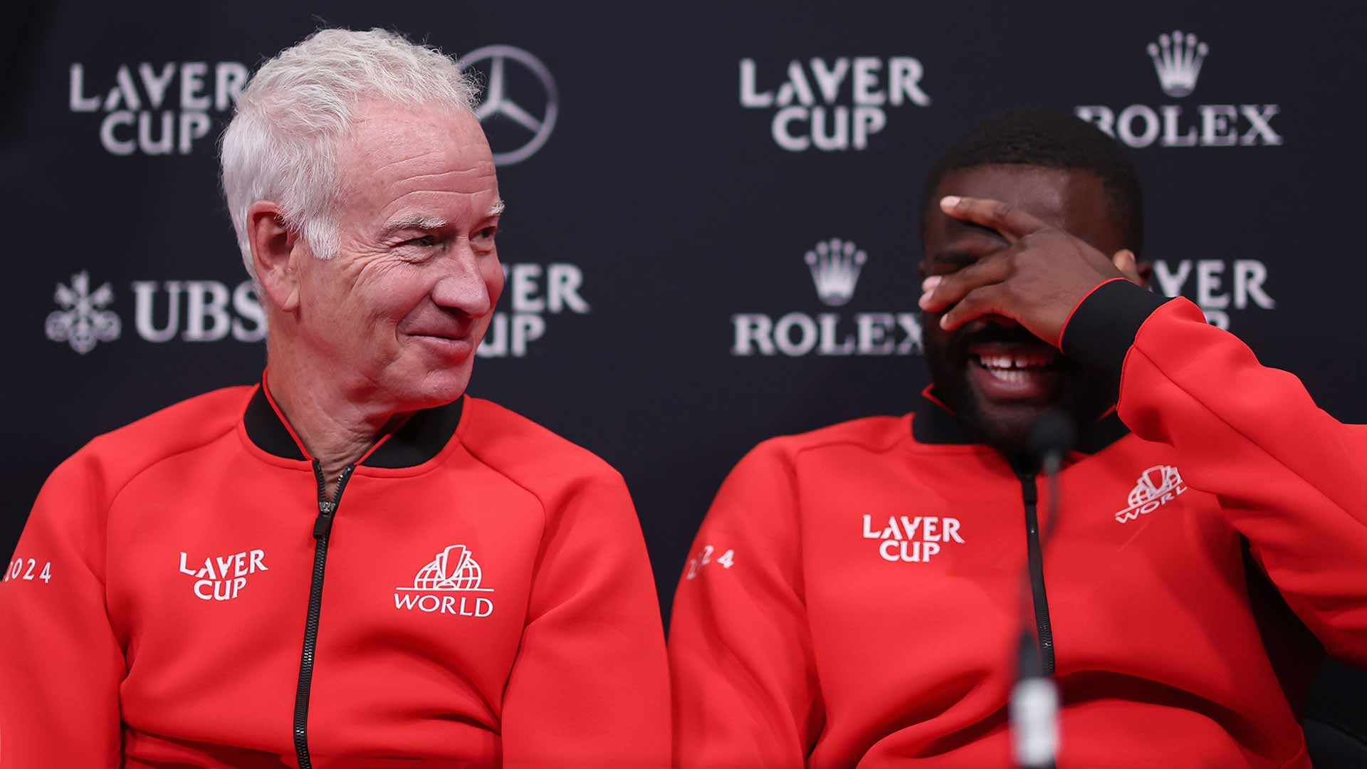 Team World's John McEnroe and Frances Tiafoe share a laugh on Thursday afternoon ahead of the 2024 Laver Cup.