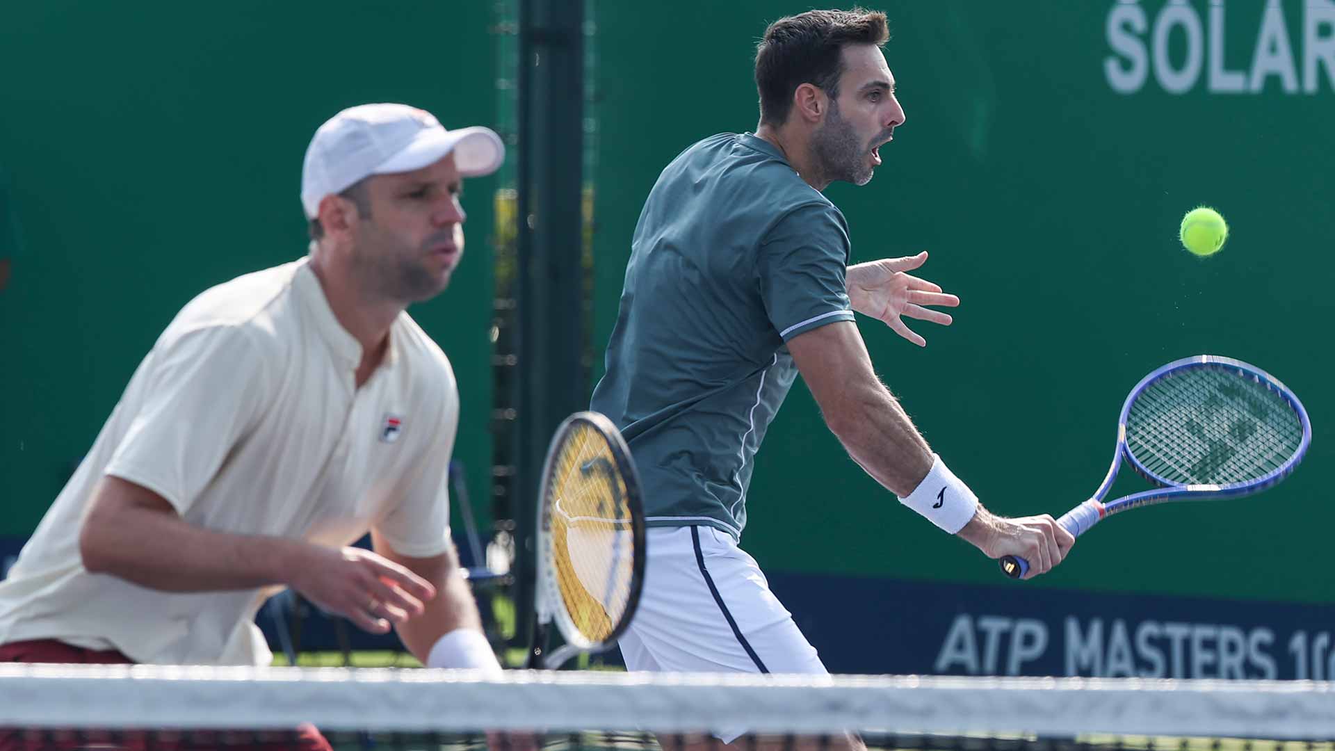 Horacio Zeballos and Marcel Granollers in action on Tuesday at the Rolex Shanghai Masters.