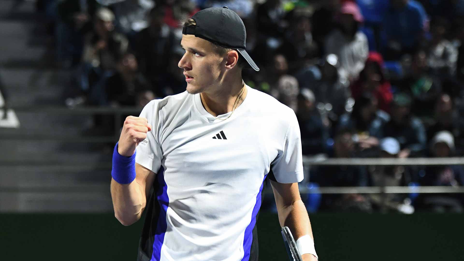 Jakub Mensik defeats Grigor Dimitrov in three sets on Wednesday in Shanghai.