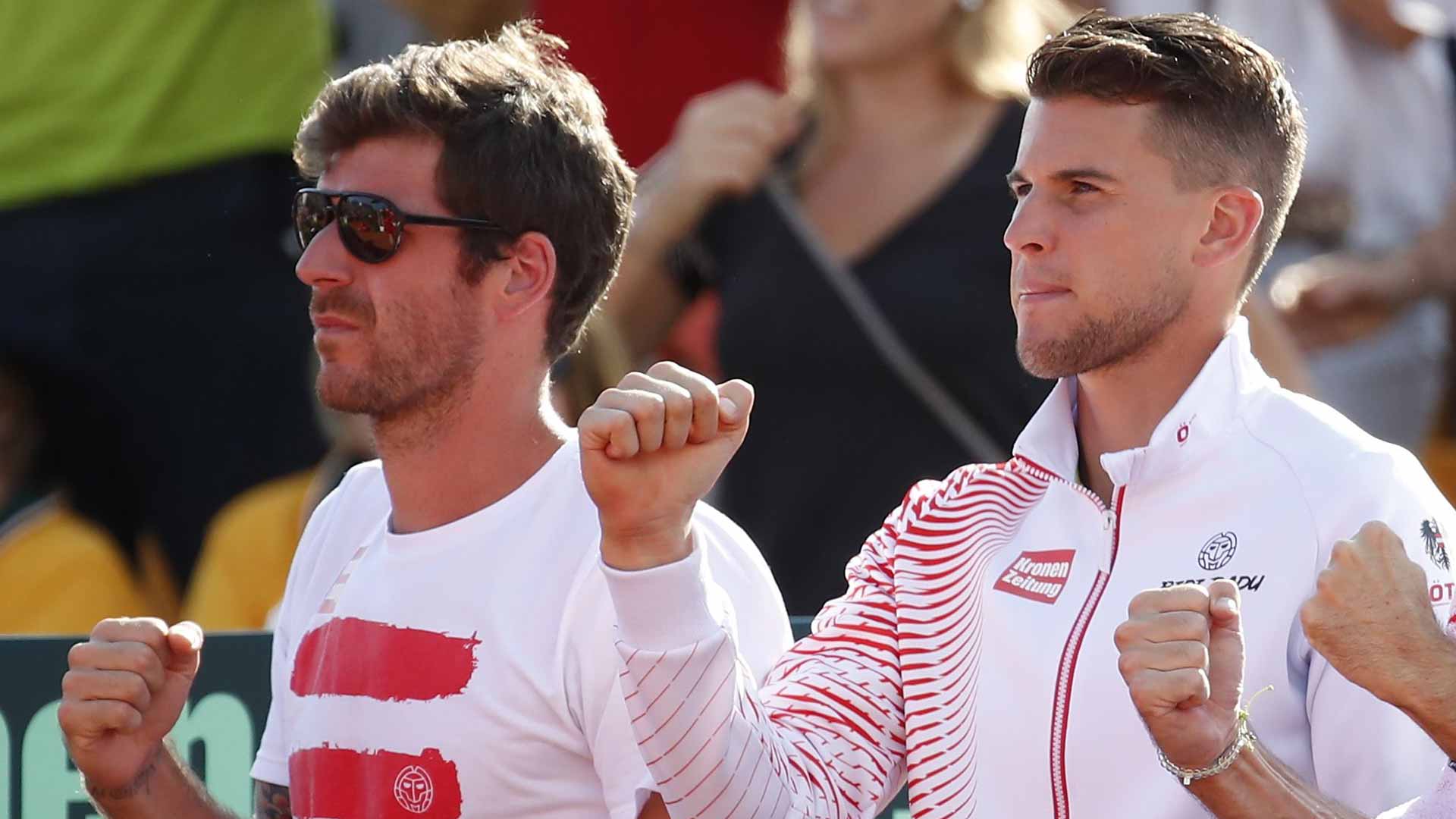 <a href='https://www.atptour.com/en/players/gerald-melzer/mi43/overview'>Gerald Melzer</a> and <a href='https://www.atptour.com/en/players/dominic-thiem/tb69/overview'>Dominic Thiem</a> at a Davis Cup tie in 2018.
