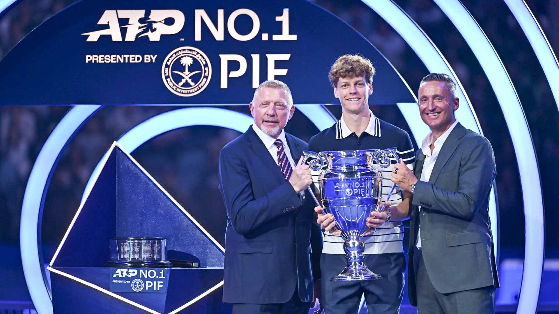 Boris Becker, Jannik Sinner and Andrea Gaudenzi celebrate Sinner's ATP Year-End No. 1 presented by PIF finish on Monday in Turin.
