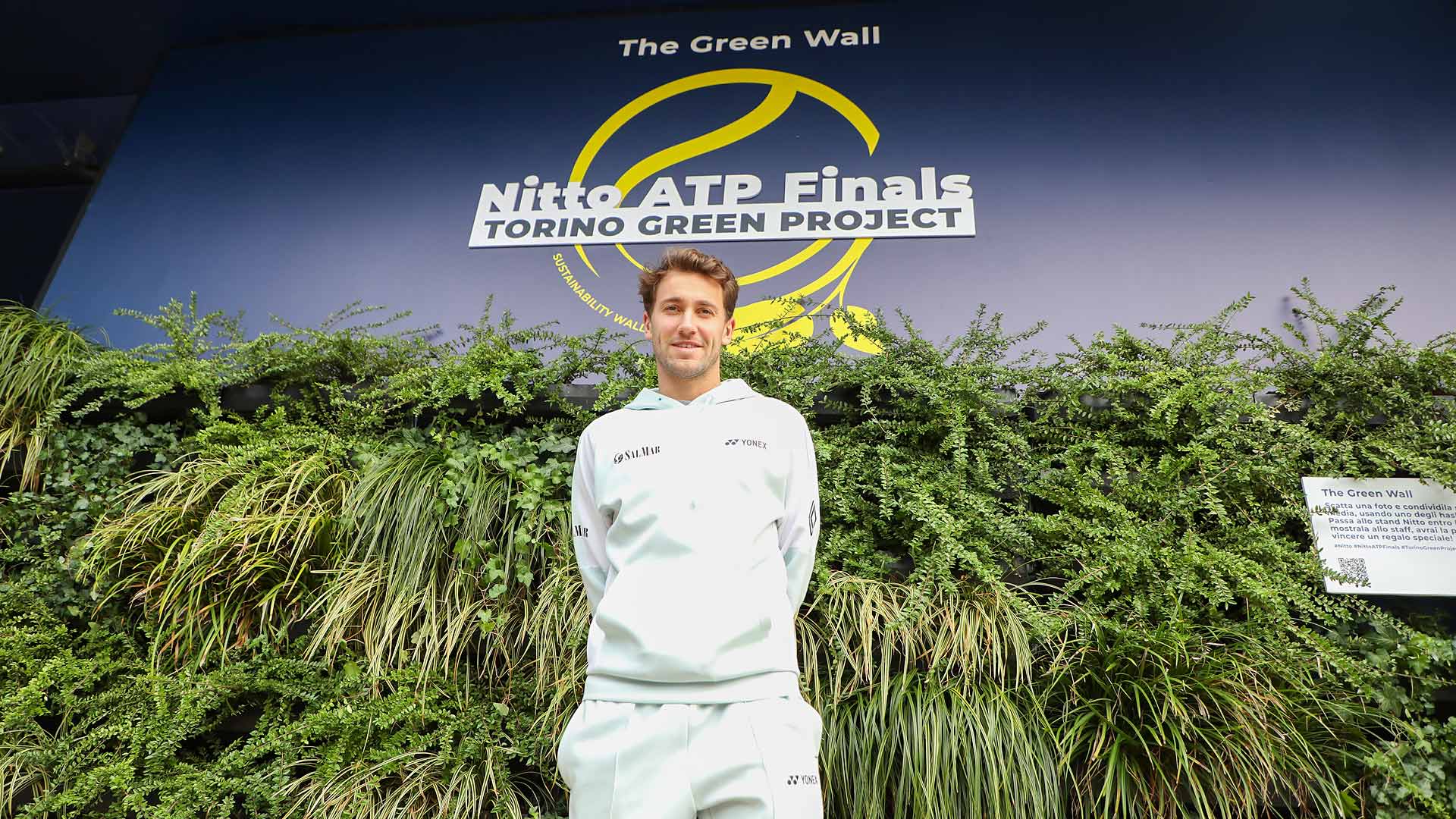 Casper Ruud visits The Green Wall outside the Inalpi Arena on Tuesday in Turin.