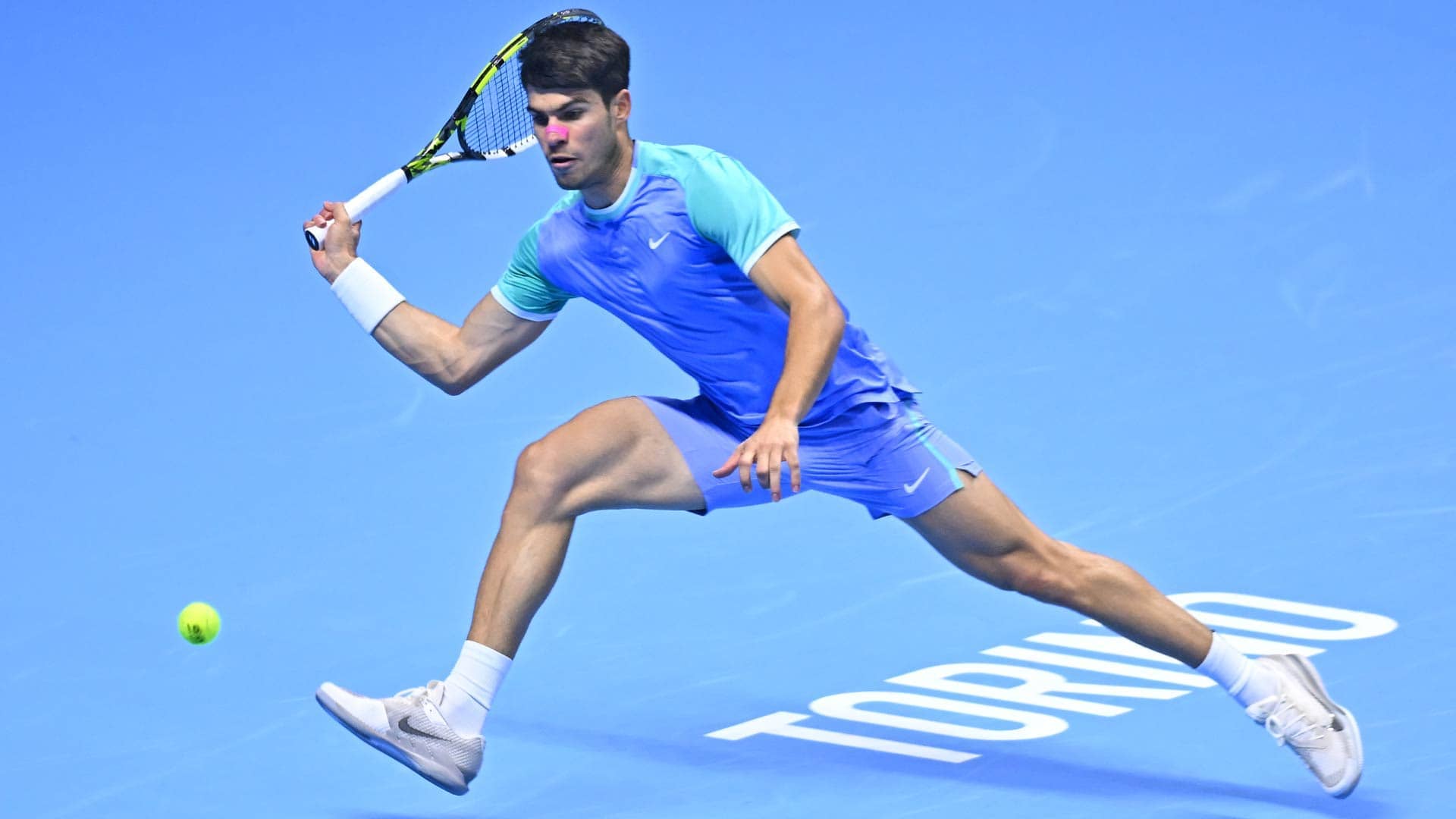Carlos Alcaraz in action at the 2024 Nitto ATP Finals.
