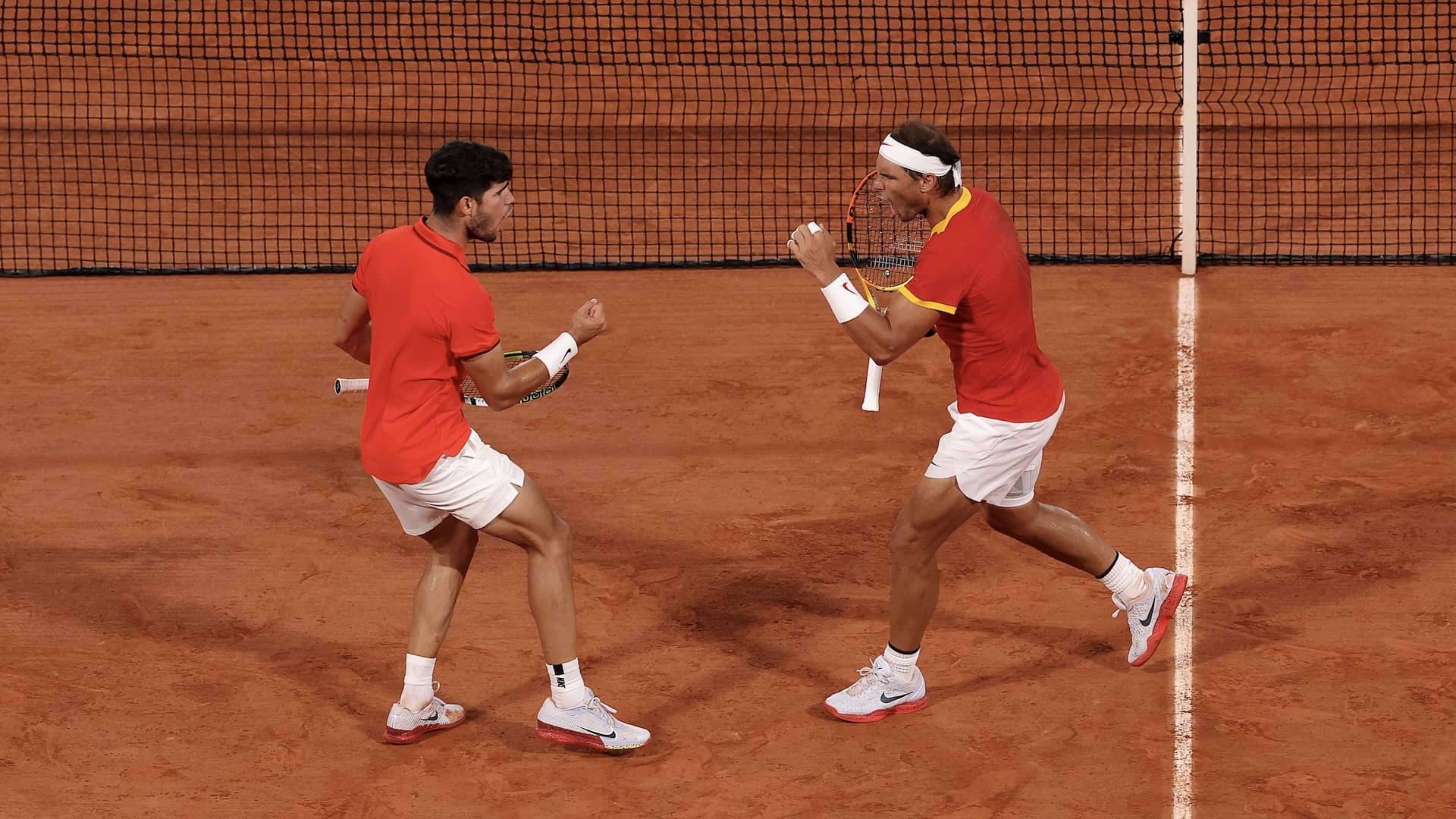 Carlos Alcaraz y Rafael Nadal, durante los Juegos Olímpicos de París 2024.