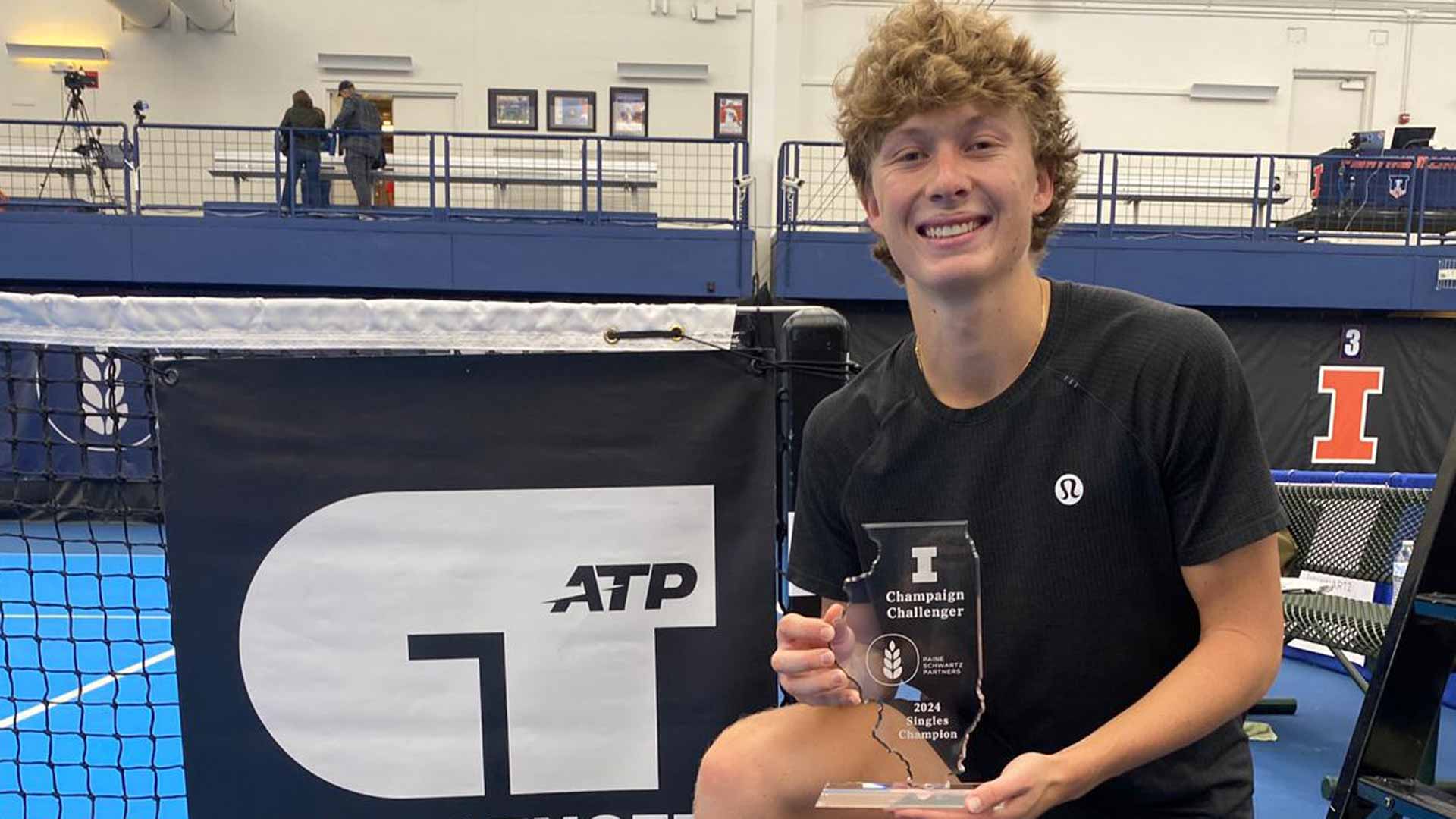 <a href='https://www.atptour.com/en/players/ethan-quinn/q02l/overview'>Ethan Quinn</a> is crowned champion at the ATP Challenger Tour 75 event in Champaign, Illinois.