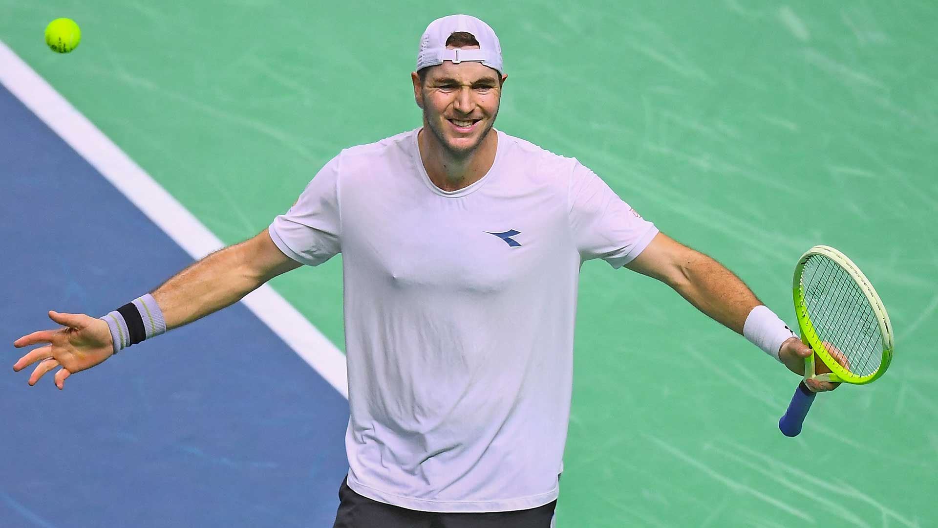 Jan-Lennard Struff celebrates after clinching Germany a semi-final spot at the Davis Cup Final 8.