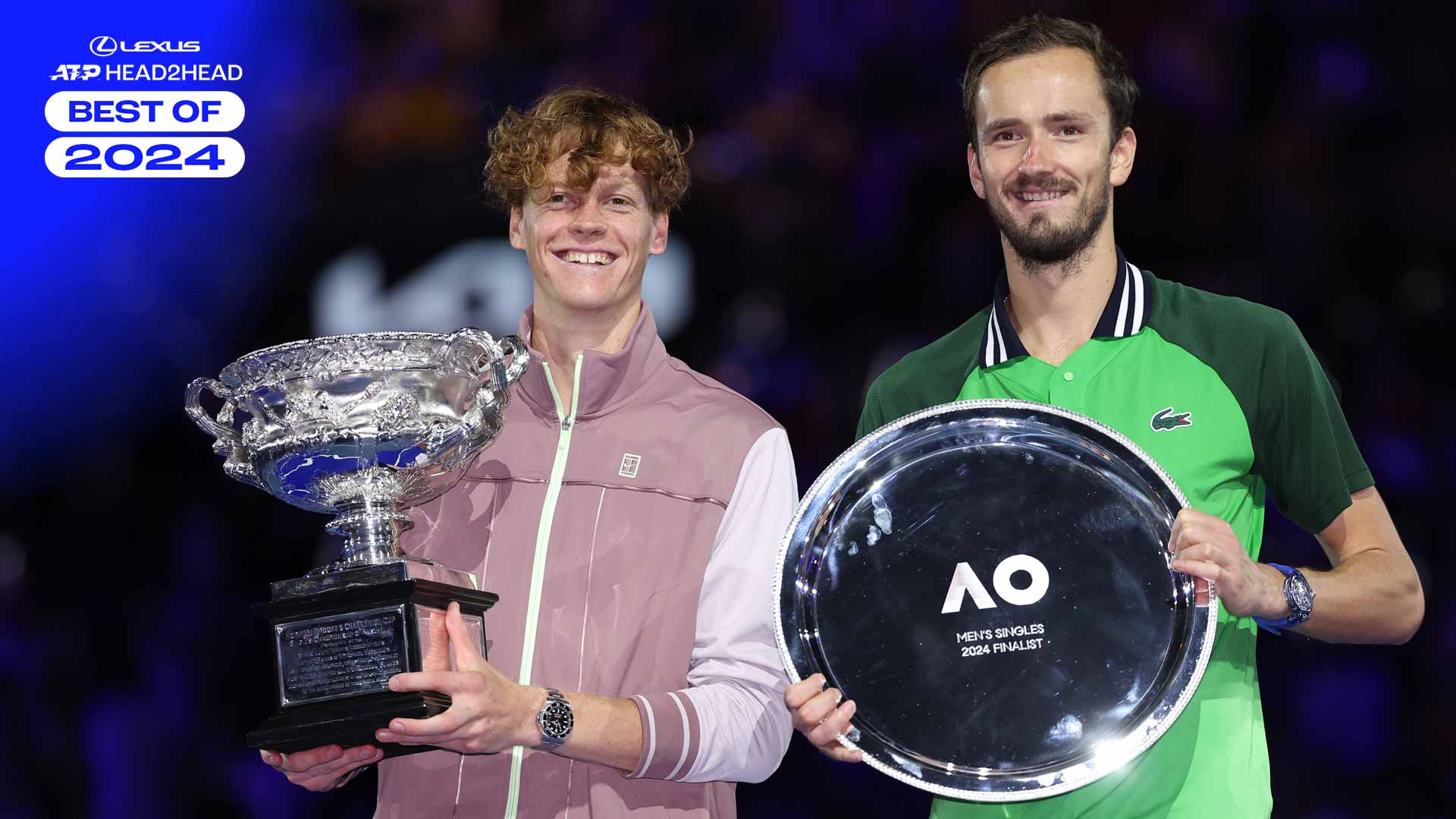 Jannik Sinner and Daniil Medvedev at the 2024 Australian Open trophy ceremony.